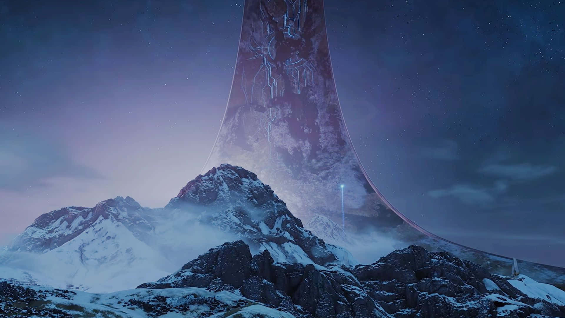 Halo Infinite 桌布 壁紙 — 在繁星點點的暮色天空下，一座巨大的未來主義巨石從白雪覆蓋的山峰上崛起。