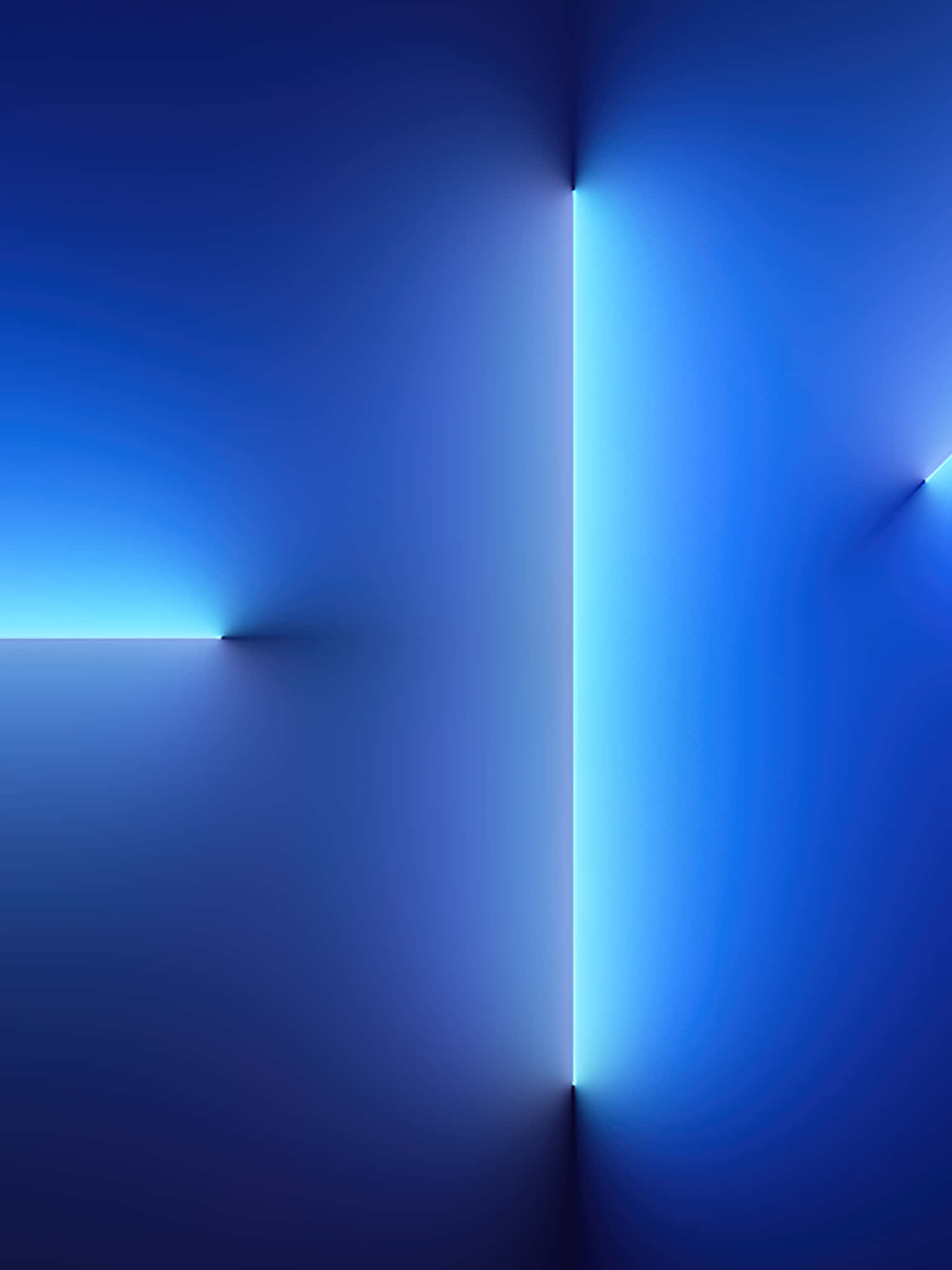 Blue Neon 桌布 壁紙 — 在黑暗空間中交錯的發光藍色光束，形成極簡抽象構圖，營造寧靜的未來感氛圍。