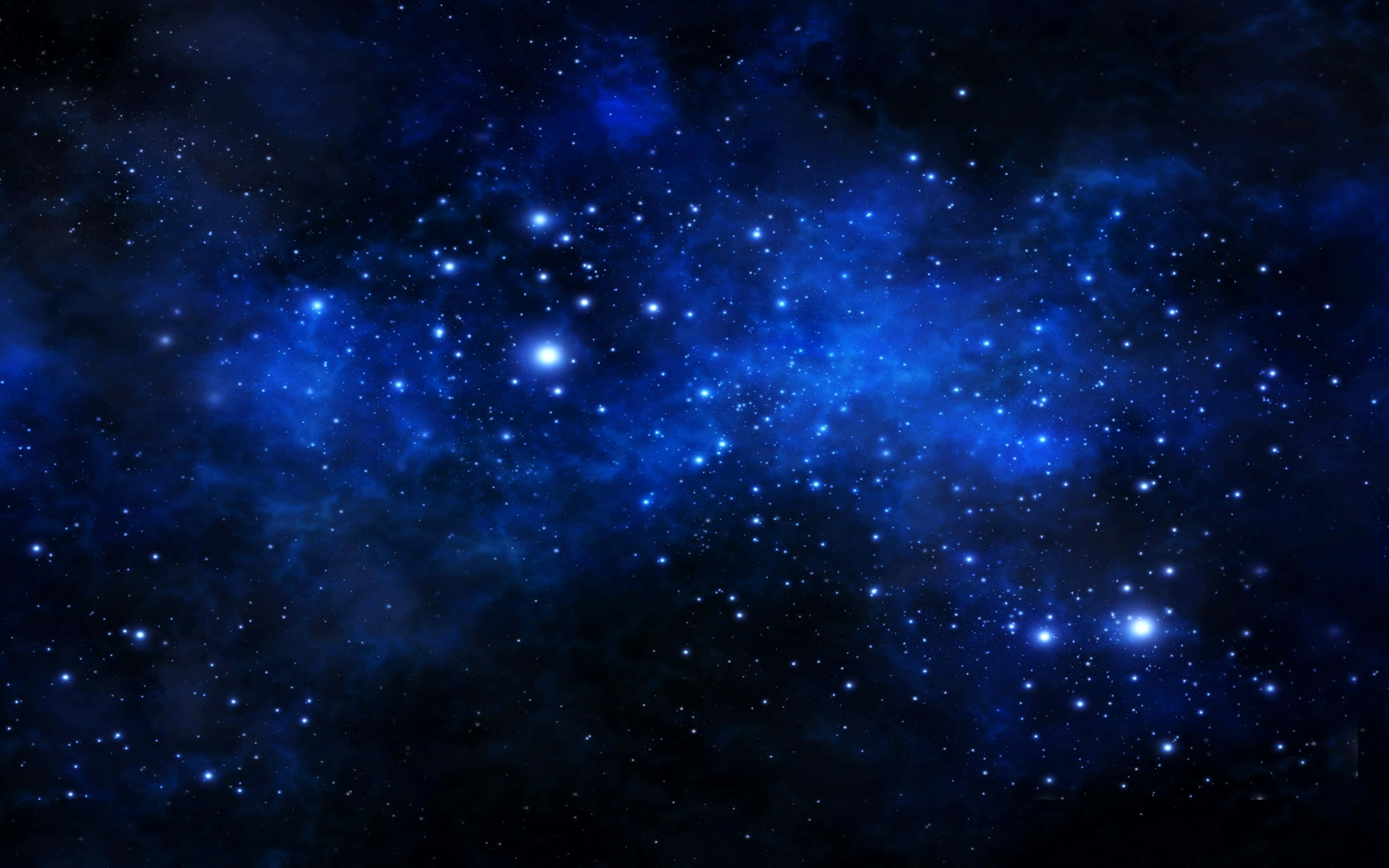 宇宙 桌布 壁紙 — 在黑暗虛空中，充滿發光恆星和宇宙塵埃的深藍色星雲的壯麗景色。