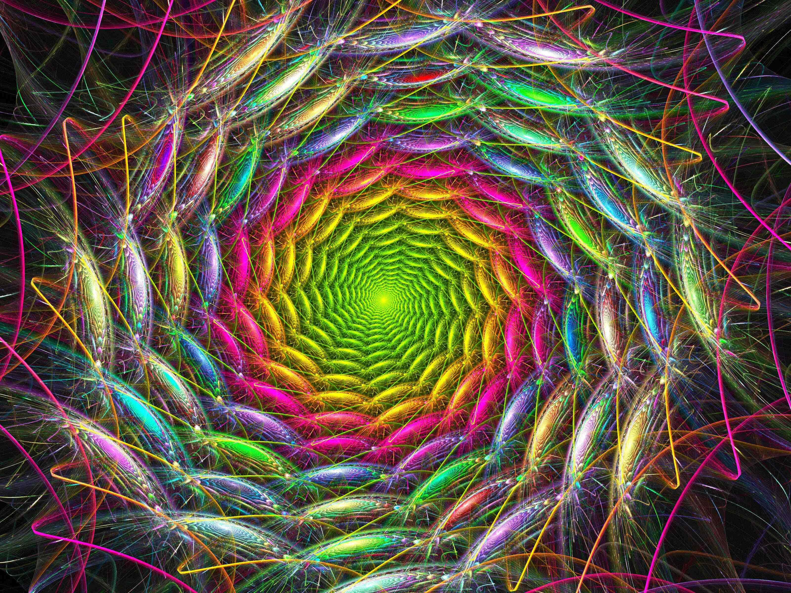 Trippy Fractals 桌布 壁紙 — 在黑色背景上，霓虹色的分形卷鬚以螺旋狀匯聚成發光的綠色漩渦，令人著迷。