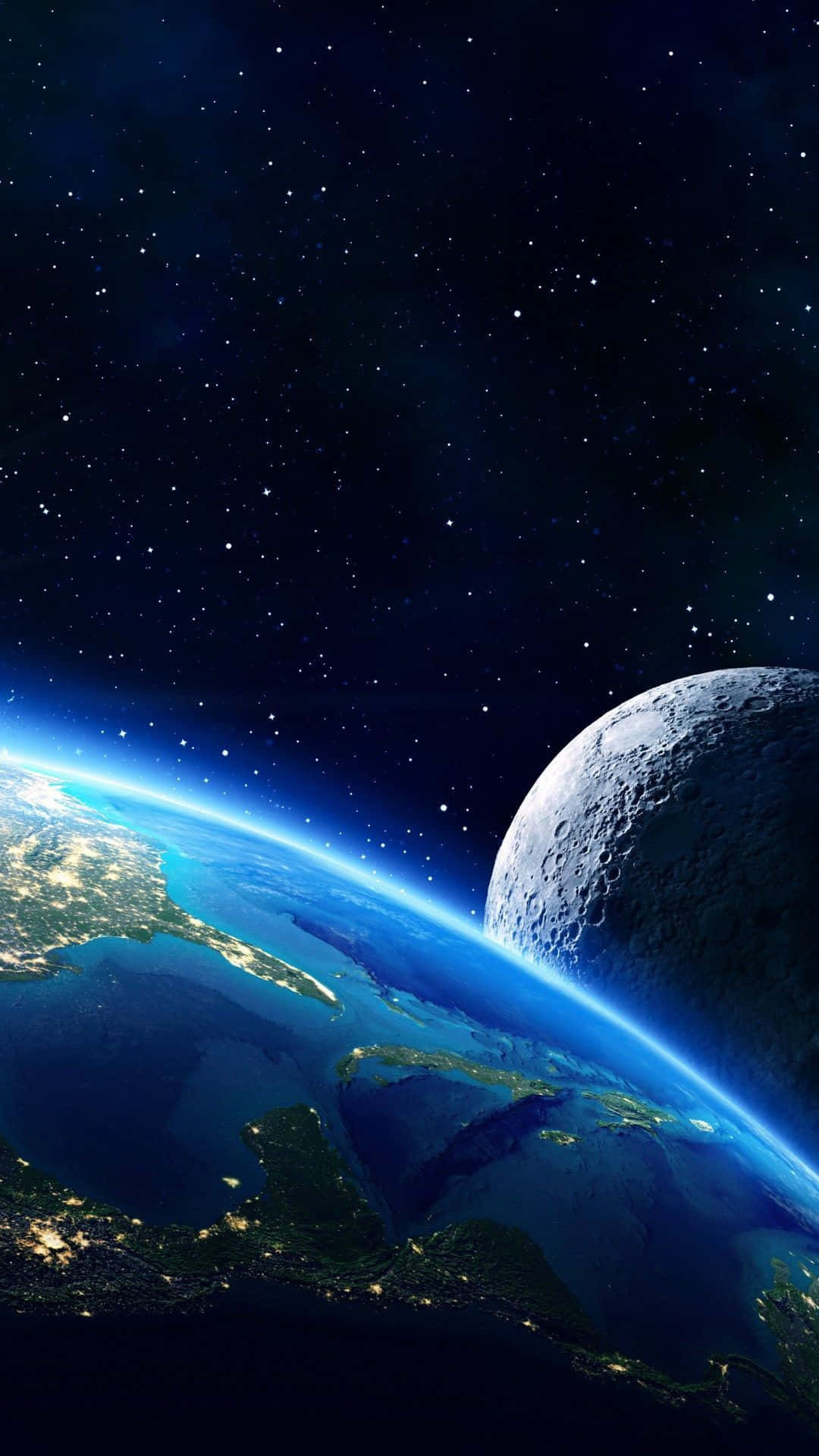 planet earth 桌布 壁紙 — 地球和月亮在繁星點點的宇宙背景下發光，帶有充滿活力的藍色大氣層和閃爍的城市燈光。