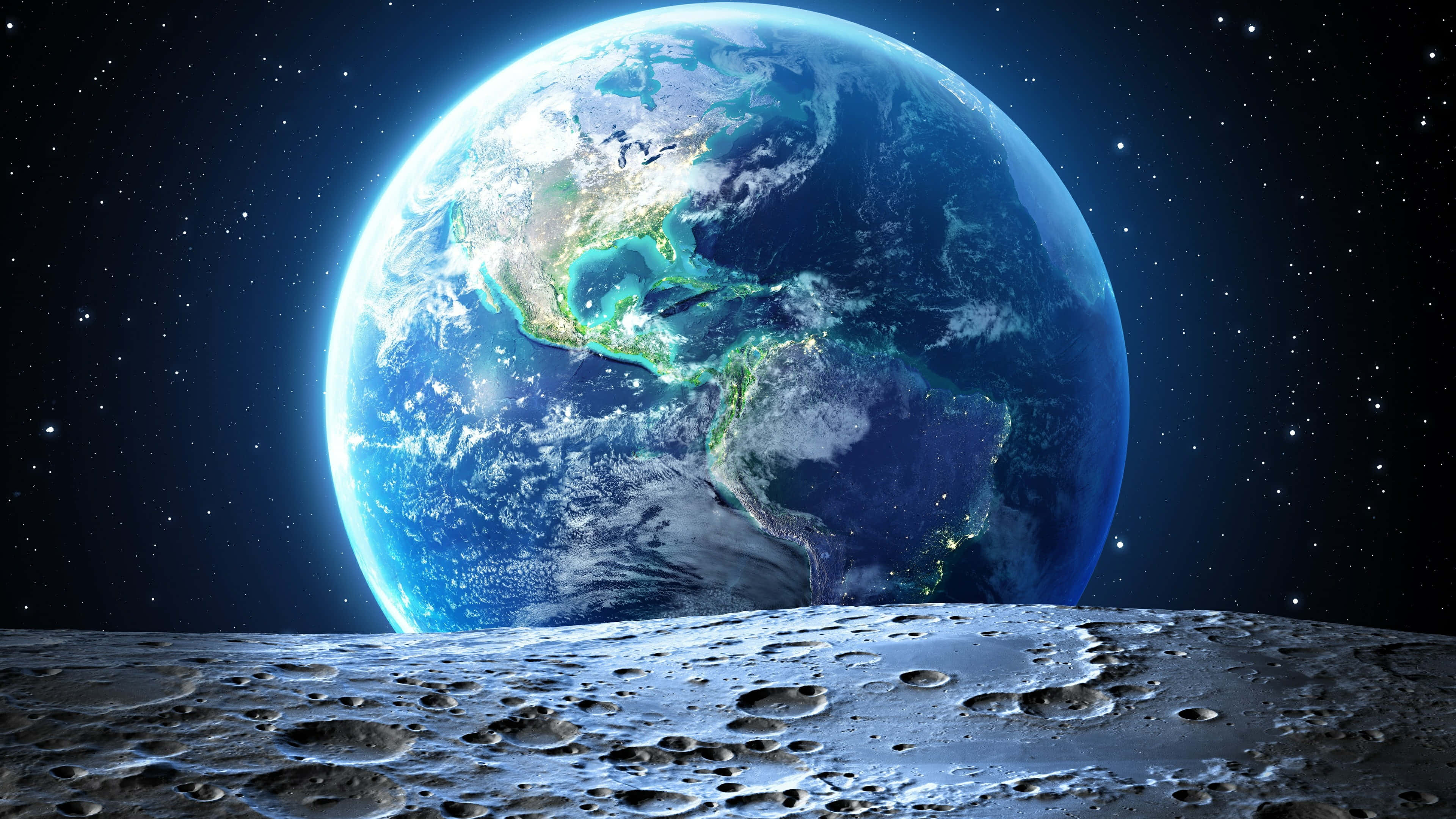 Space Art 桌布 壁紙 — 地球在月球佈滿隕石坑的表面上升起，城市燈光在繁星點點的宇宙背景下閃耀。