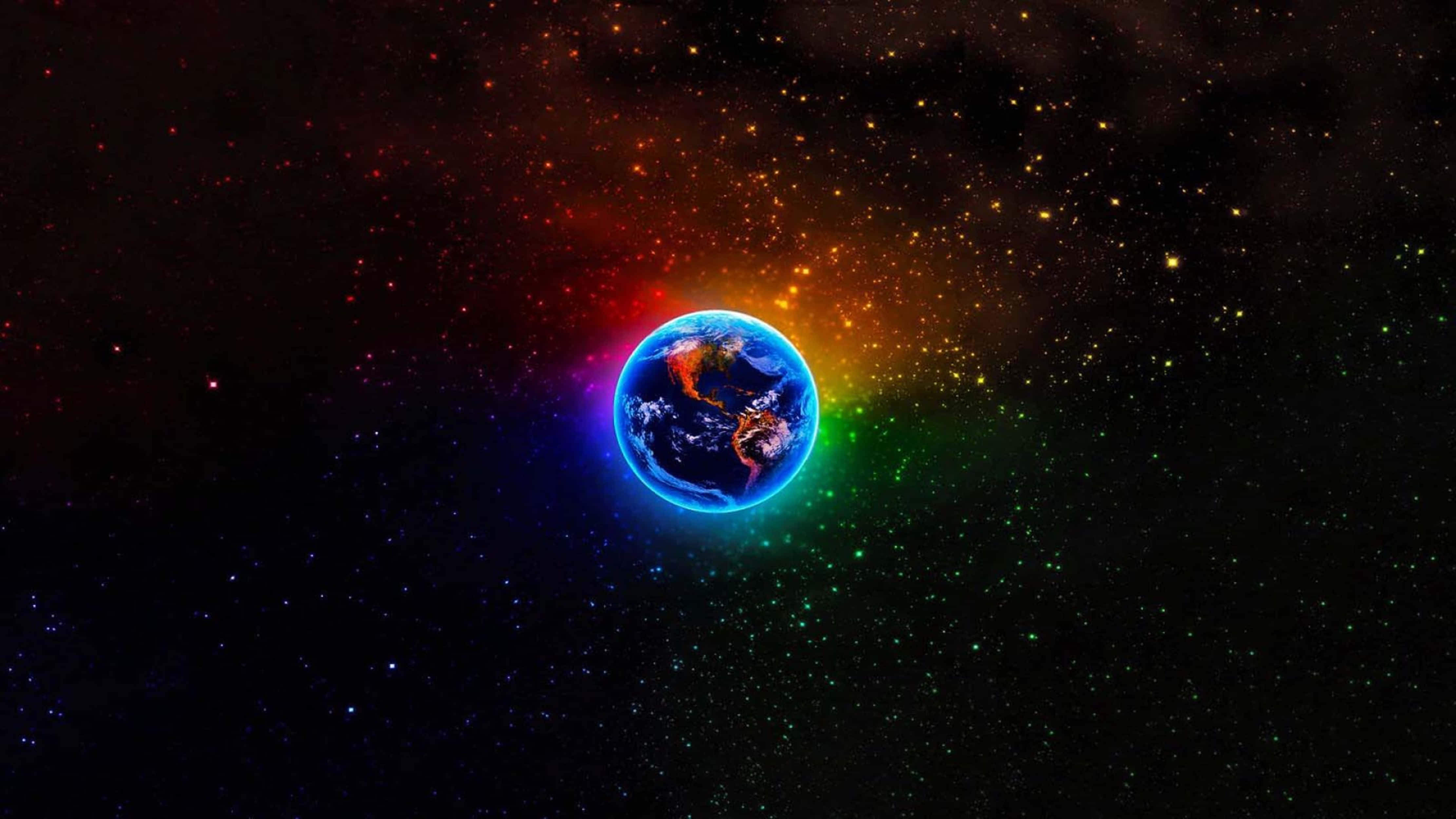 高清 桌布 壁紙 — 地球散發著鮮豔的彩虹光環，背景是佈滿星星和彩色星雲的宇宙。