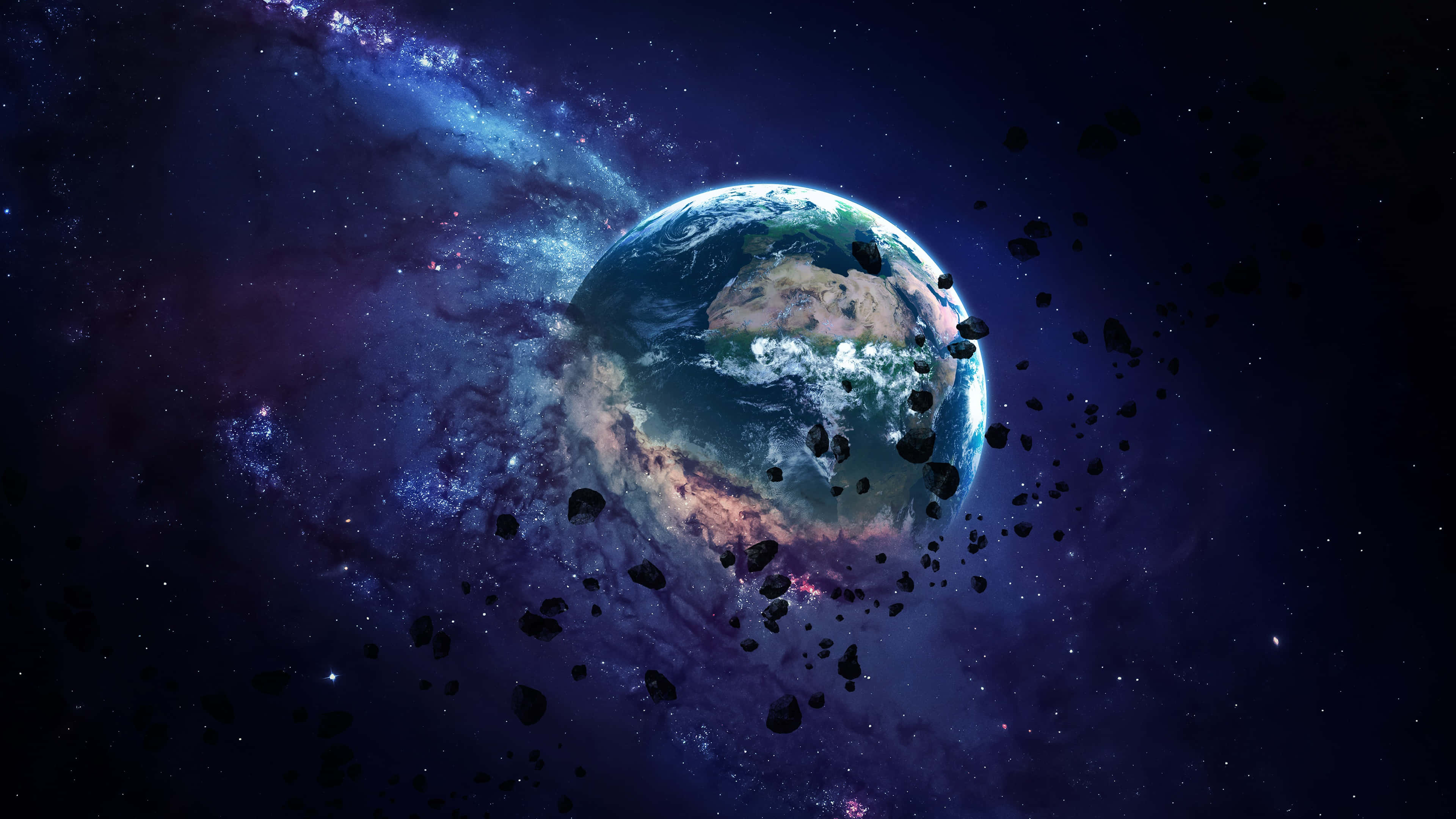 地球 桌布 壁紙 — 地球漂浮在充滿活力的宇宙星雲中，周圍環繞著漂浮的小行星，背景是繁星點點的夜空。