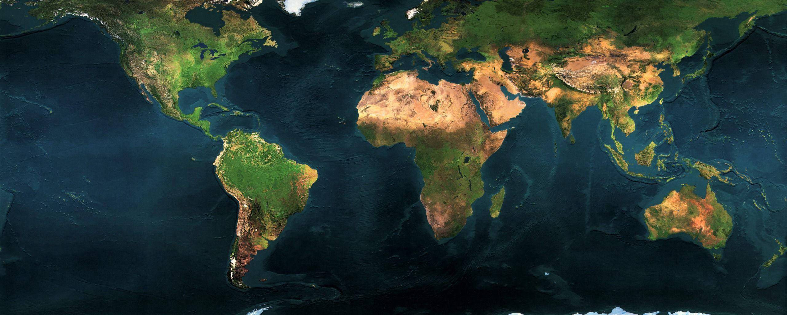 World Globe 桌布 壁紙 — 地球的衛星視圖，顯示大陸和海洋，充滿活力的綠色森林和深藍色海洋。