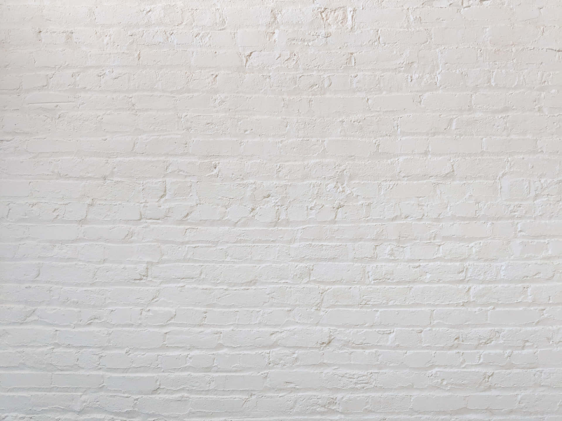 Simple White 桌布 壁紙 — 均勻照明下，帶有細微紋理和砂漿線的清潔白色油漆磚牆。