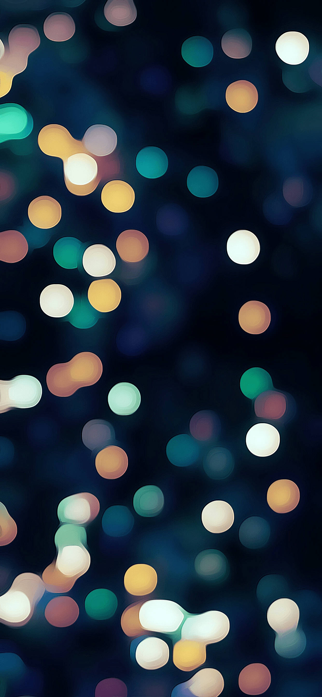 Christmas Lights iPhone 桌布 壁紙 — 垂直抽象壁紙，在深色背景上呈現溫暖與冷色調的發光散景燈光。
