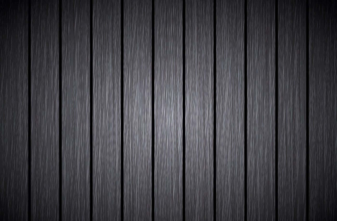 Gray Wood 桌布 壁紙 — 垂直深色木板，帶有細微木紋紋理和柔和漸變燈光。