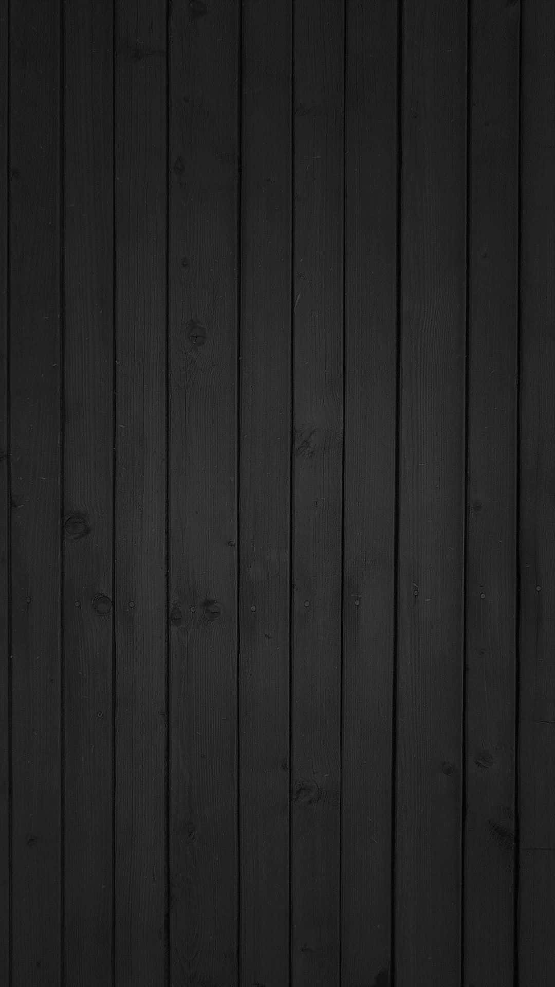 Background Design 桌布 壁紙 — 垂直黑色木板帶有細微木紋和節疤，營造出極簡紋理背景。