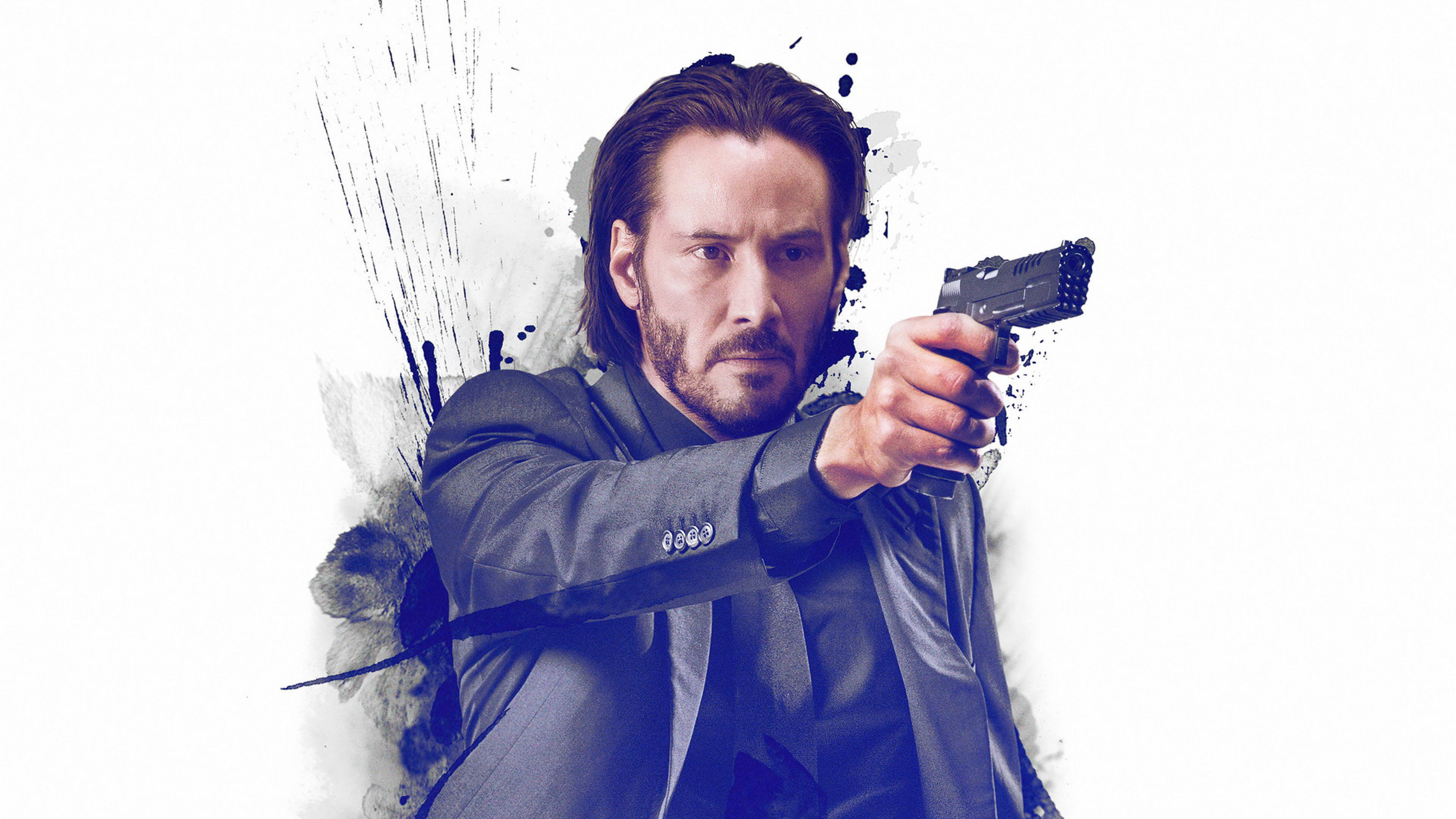 John Wick 桌布 壁紙 — 基努·李維飾演約翰·維克，在純白背景上以強烈專注力瞄準手槍，並帶有戲劇性的墨水飛濺效果。
