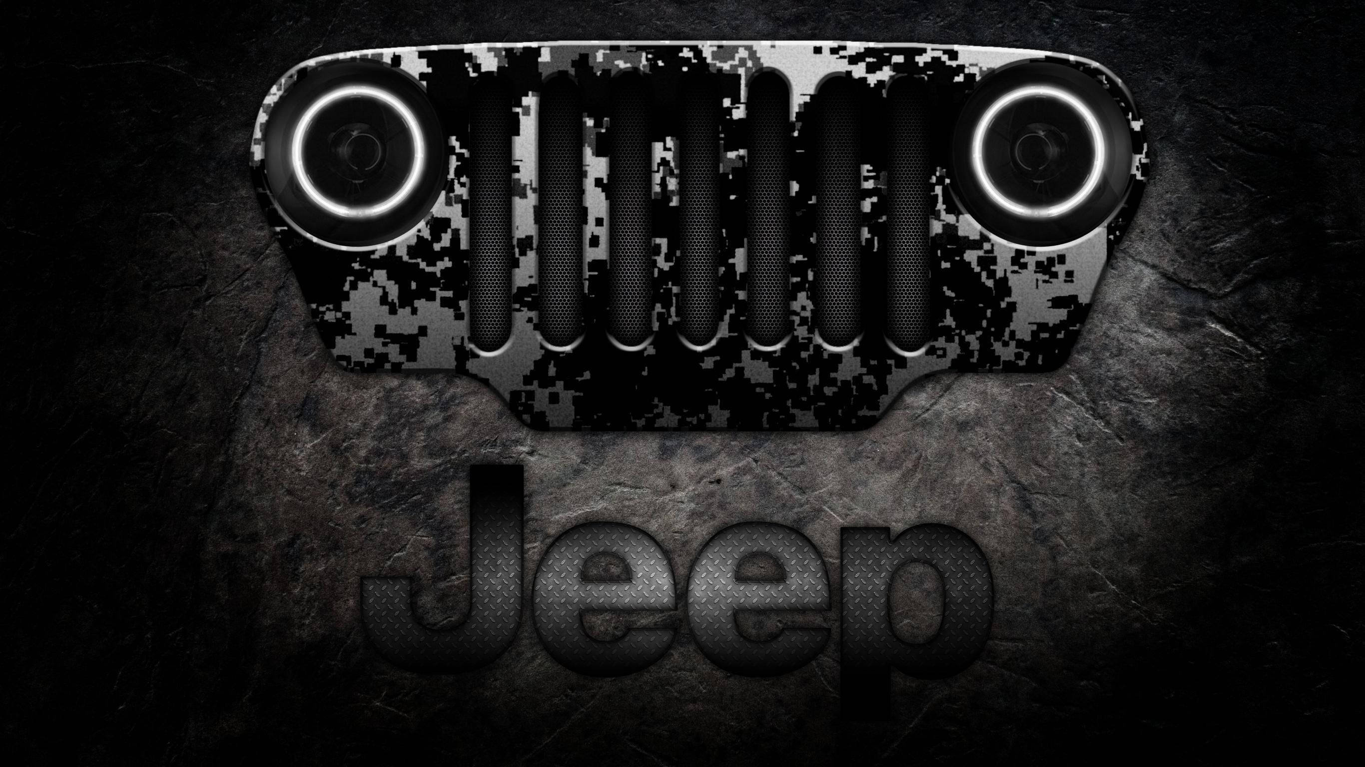 Wrangler 桌布 壁紙 — 堅固的Jeep格柵，帶有發光的頭燈和迷彩圖案，置於深色紋理石質背景上。