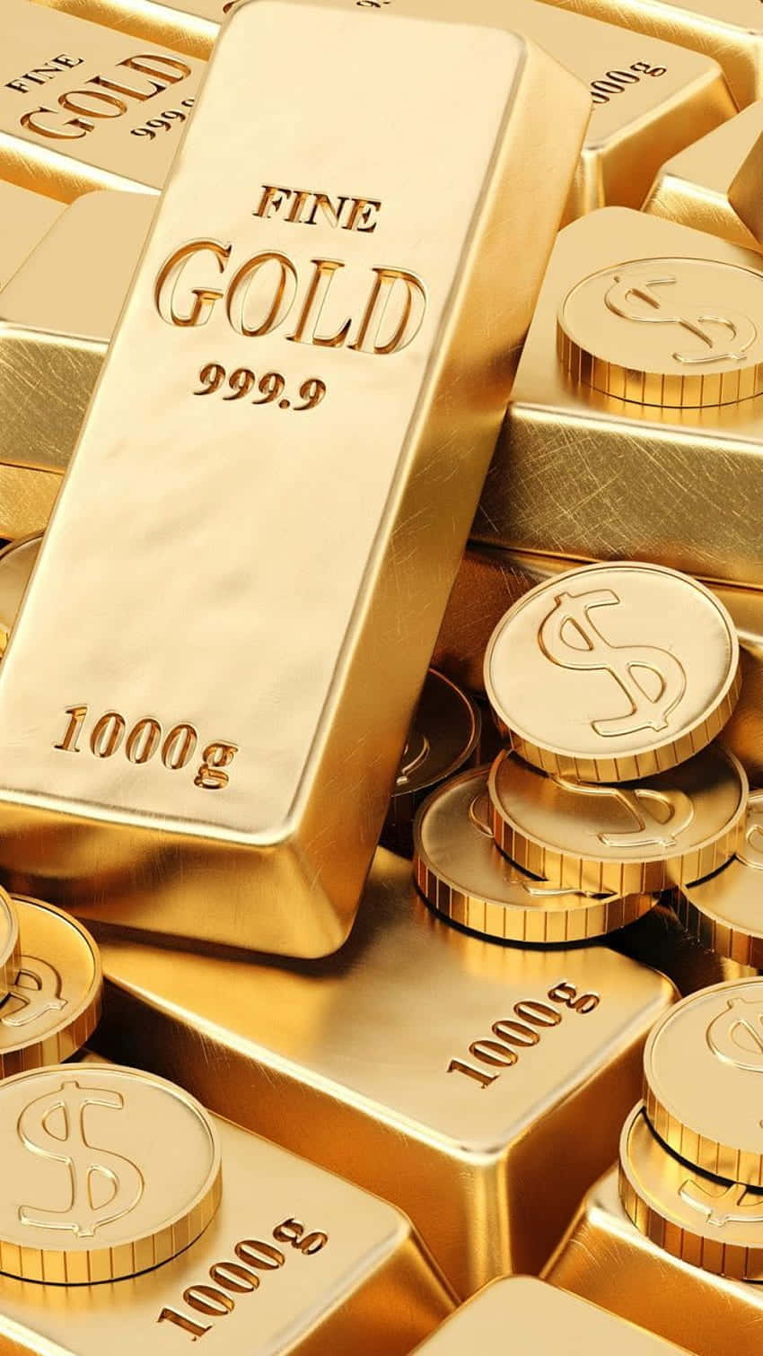金錢 桌布 壁紙 — 堆疊閃亮的金條和金幣，標有純金999.9和1000g，美元符號在明亮光線下閃爍。
