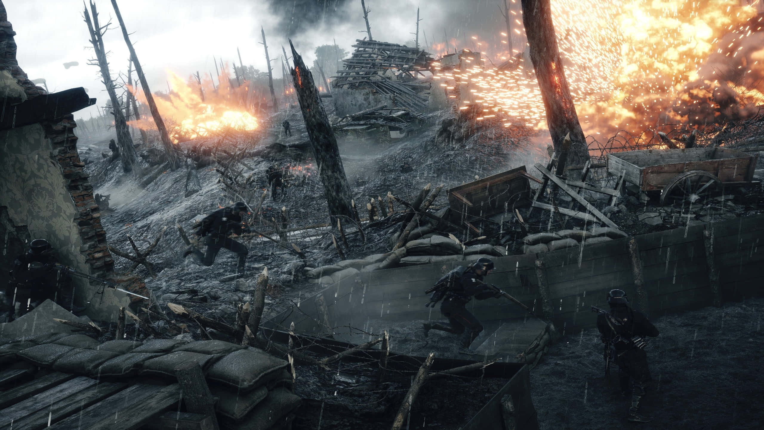 1440p Battlefield 1 桌布 壁紙 — 士兵們在雨水浸透的戰場上前進，爆炸和火焰照亮了廢墟般的景觀。