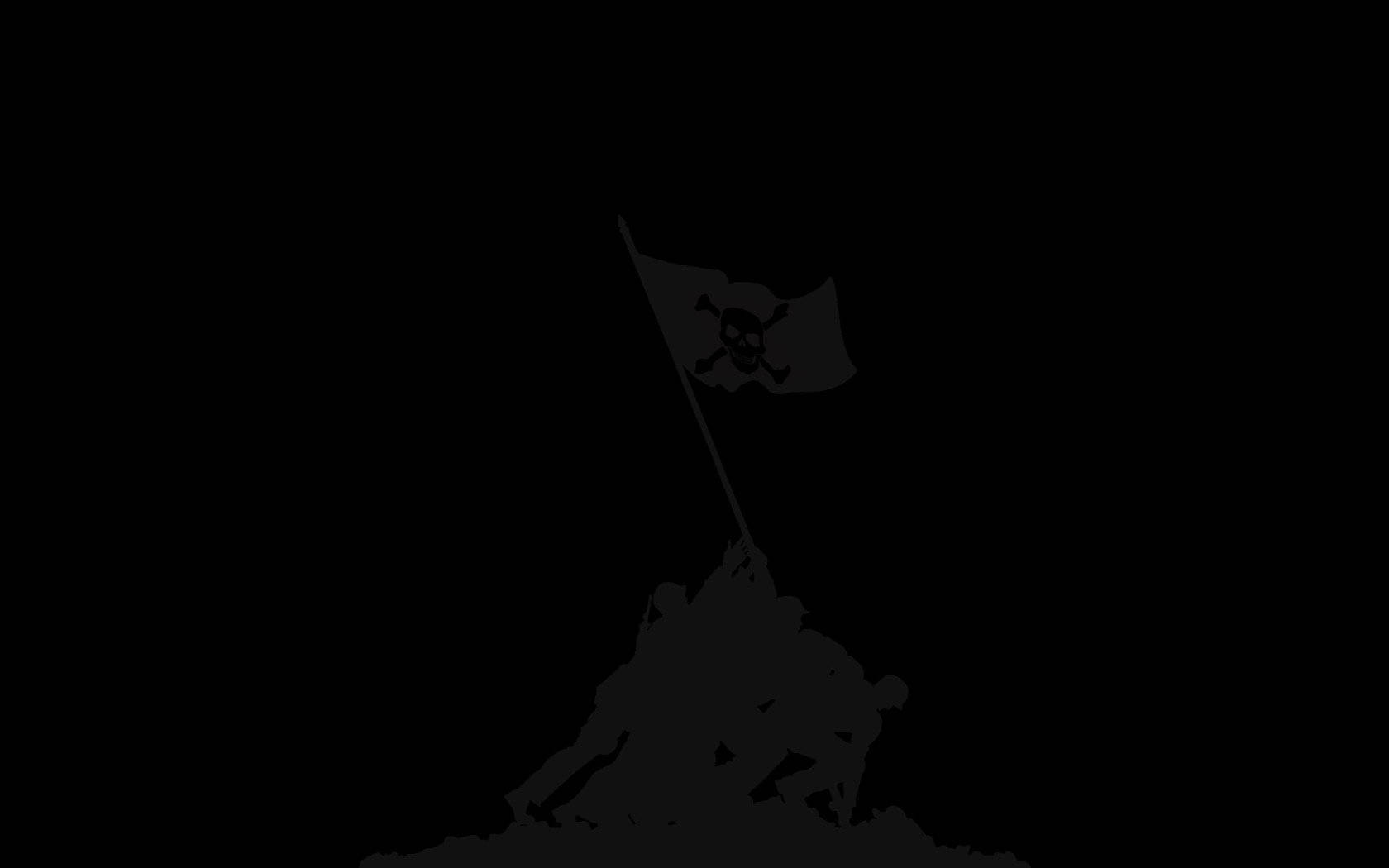 黑客 桌布 壁紙 — 士兵在山頂上舉起骷髏旗的剪影，背景為黑色。