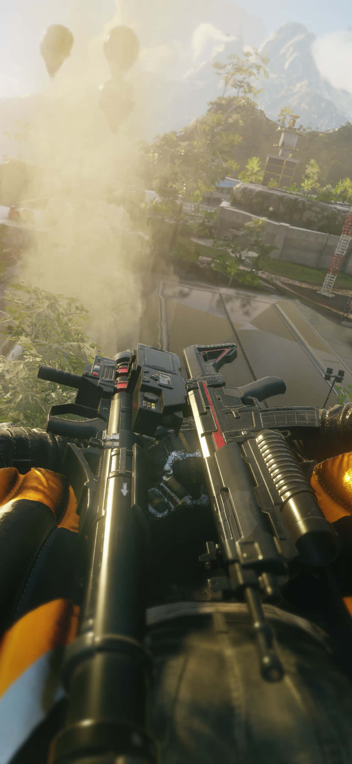 iPhone X Just Cause 4 桌布 壁紙 — 士兵在陽光明媚的叢林戰區發射重型武器，背景有遠山和熱氣球的第一人稱視角。