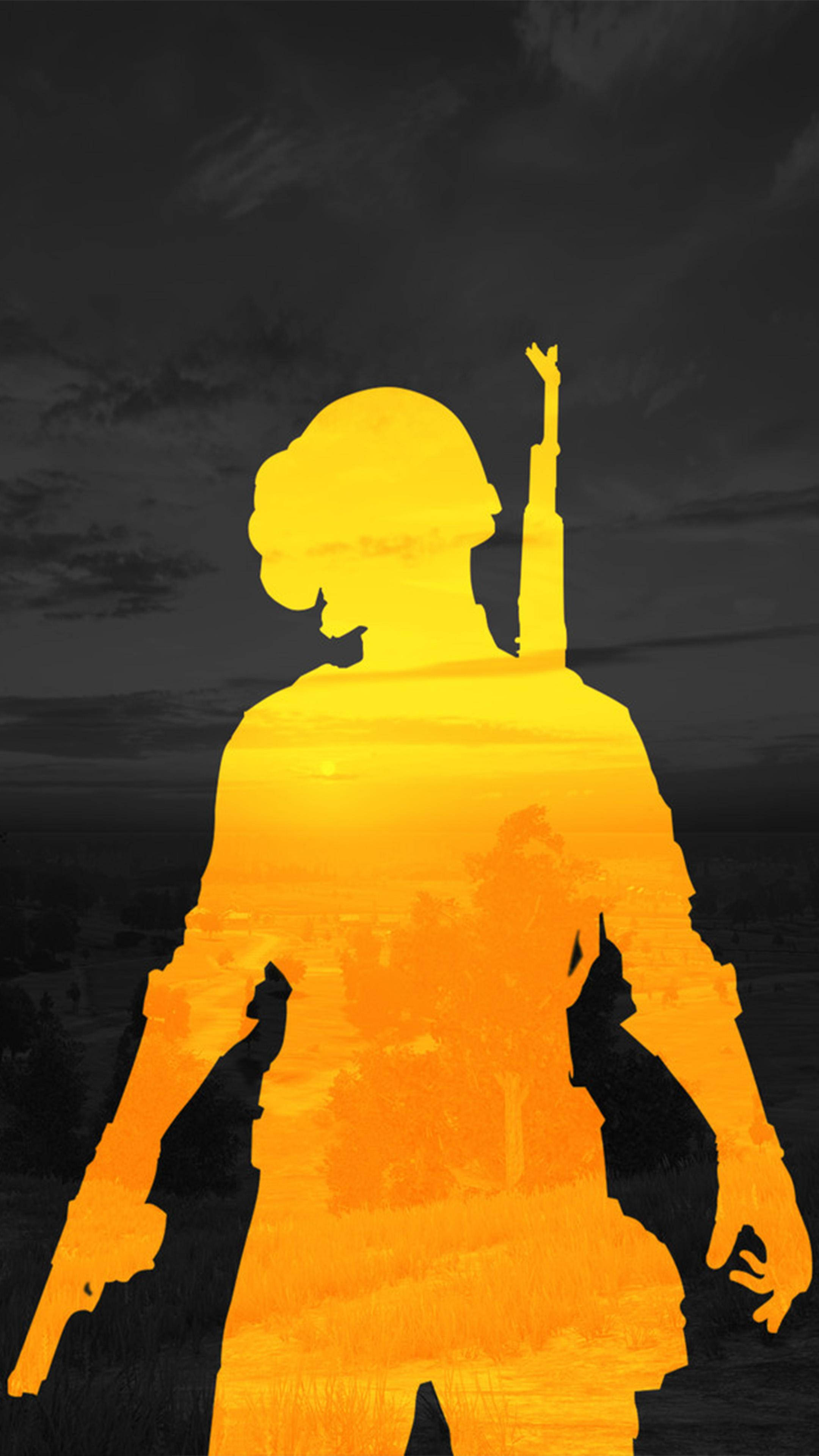 Pubg Logo 桌布 壁紙 — 士兵的剪影以鮮豔的黃橙色呈現，背景是陰暗多雲的天空，帶有雙重曝光效果。