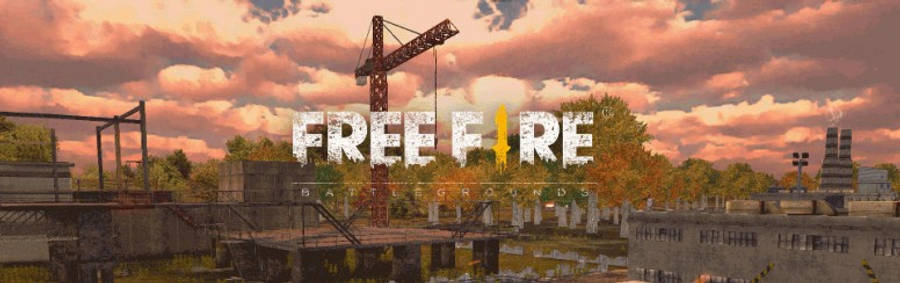 free fire banner 桌布 壁紙 — 夕陽下，生鏽的起重機聳立在破舊的工業區上空，伴隨著火紅的橙色雲彩和茂密的植被。
