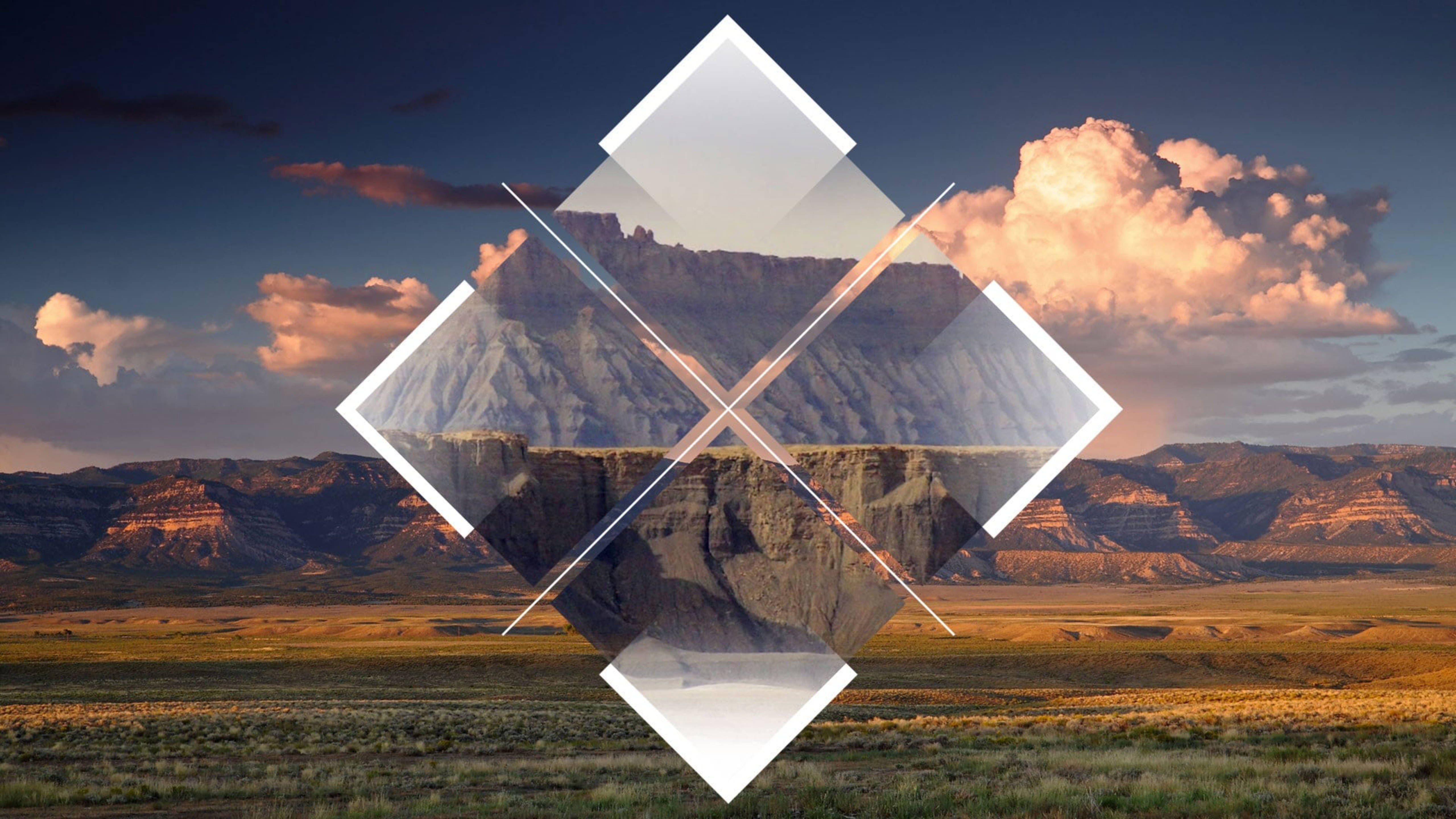 Polyscape 桌布 壁紙 — 夕陽下的沙漠峽谷景觀，以透明幾何鑽石疊加層和交叉光束框起。