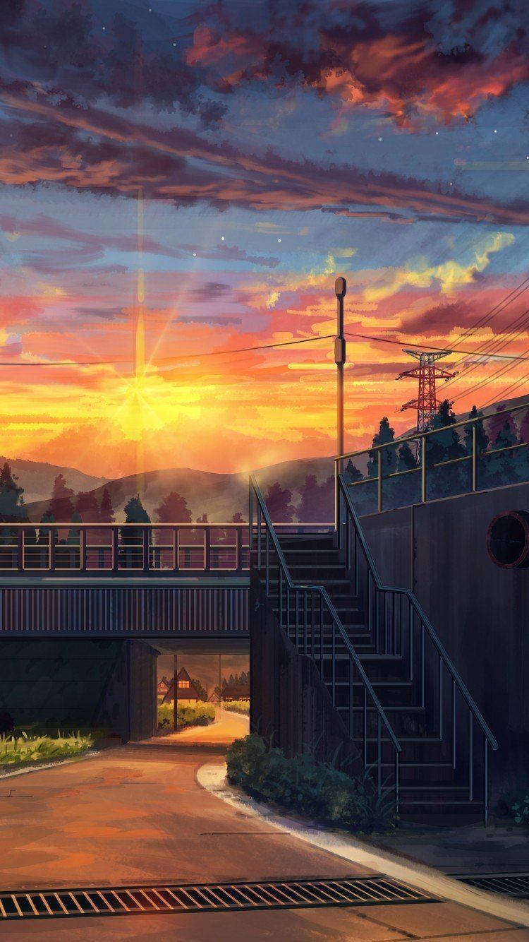 高清 桌布 壁紙 — 夕陽將天空染成橙色和紫色，火車橋在寧靜的道路上投下長長的影子。