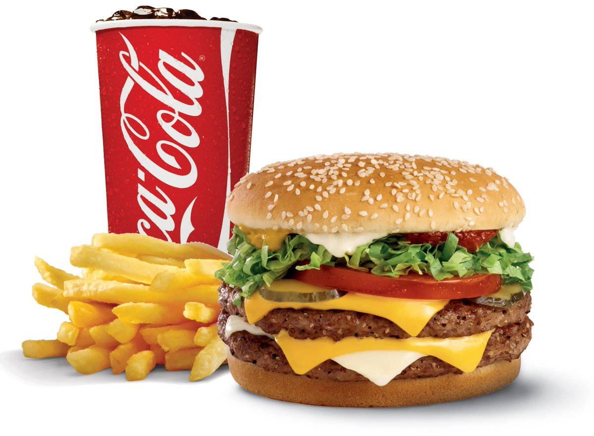 Burger 桌布 壁紙 — 多汁雙層起司漢堡配芝麻麵包、生菜、番茄和酸黃瓜，旁邊有金黃薯條和紅色可口可樂杯。