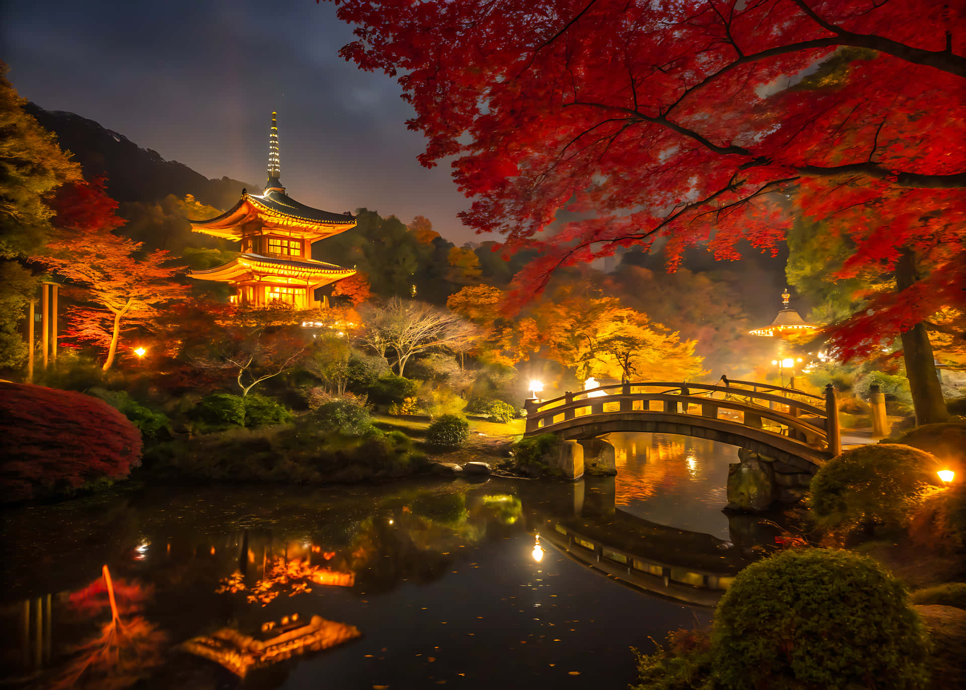 Night view of European architecture reflected in the river under a sky near the old bridge 壁紙 — 夜晚發光的傳統日本寺廟，周圍環繞著鮮豔的紅色和橙色秋葉，石橋橫跨反射的池塘。