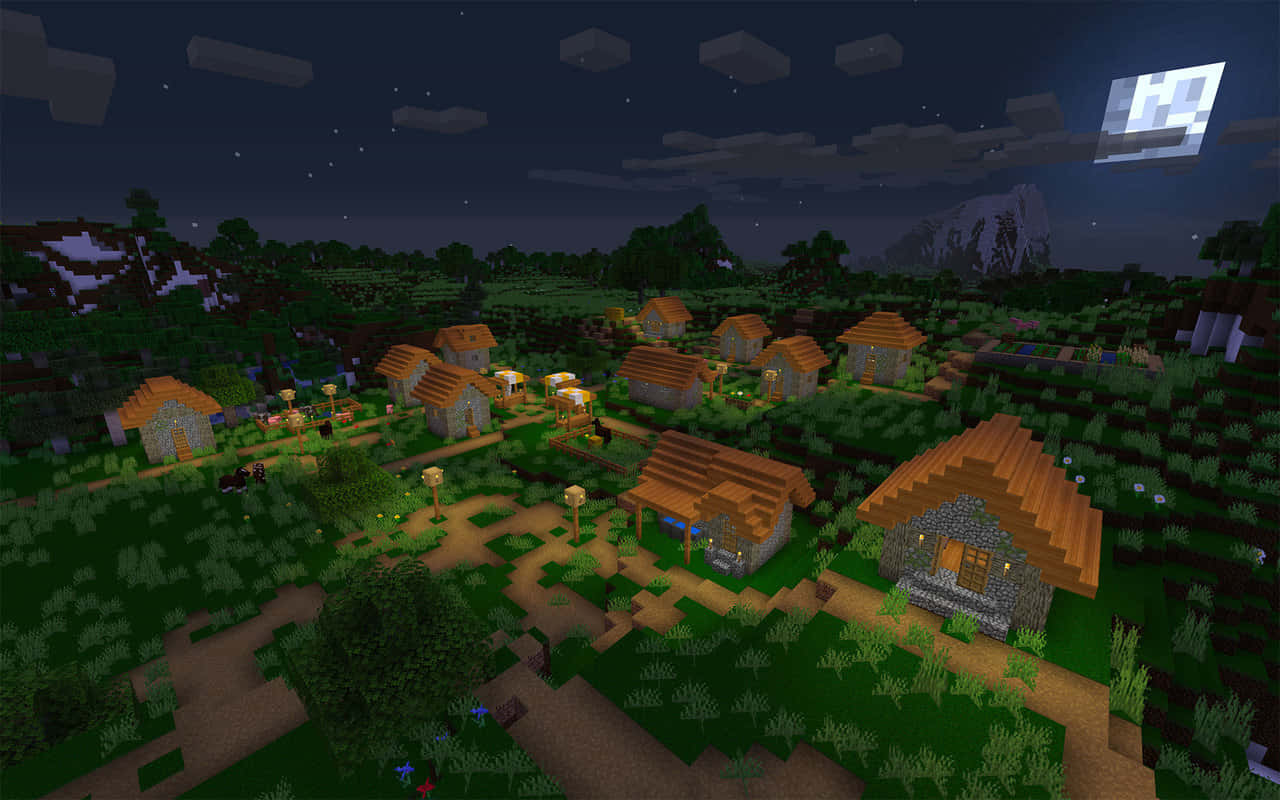 Minecraft Villages 桌布 壁紙 — 夜晚舒適的Minecraft村莊，發光的燈籠和滿月照亮了石屋和茂密的綠色植物。