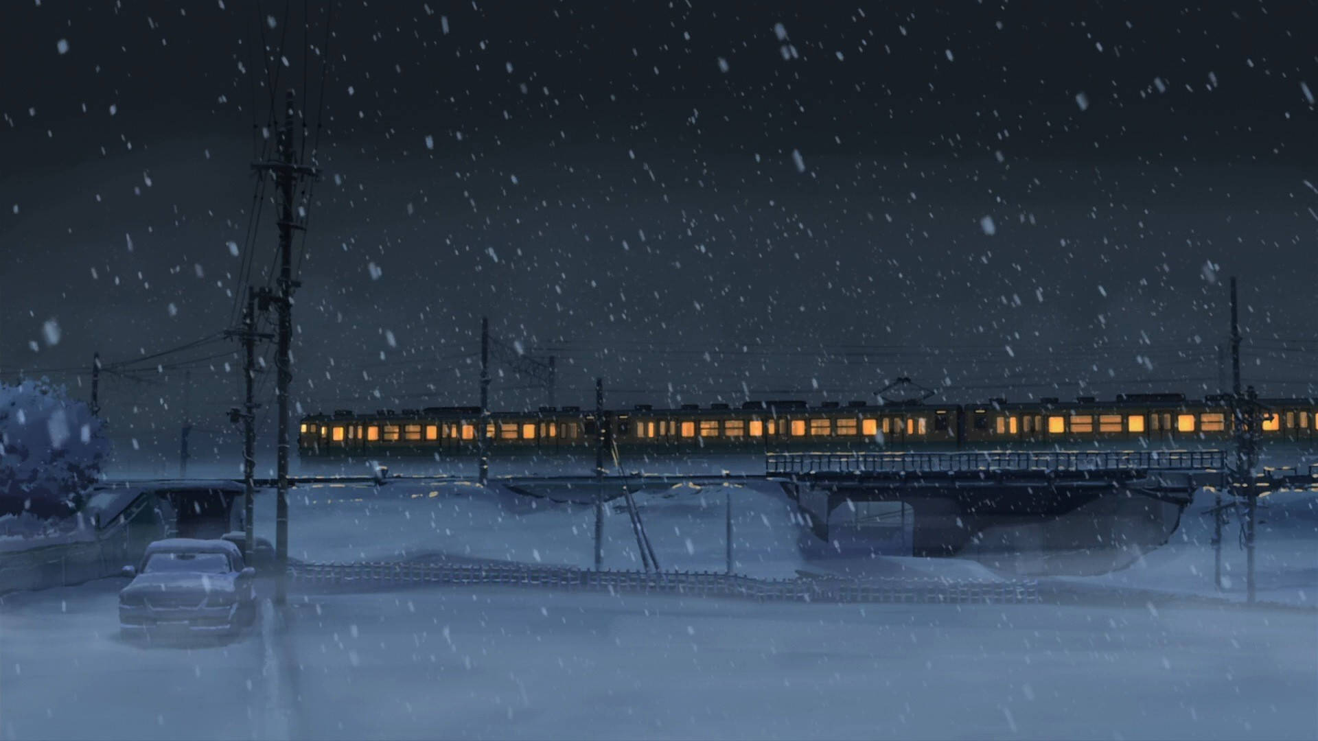 Makoto Shinkai 桌布 壁紙 — 夜晚被雪覆蓋的火車橋，一列燈光溫暖的火車在飄落的雪花下行駛。