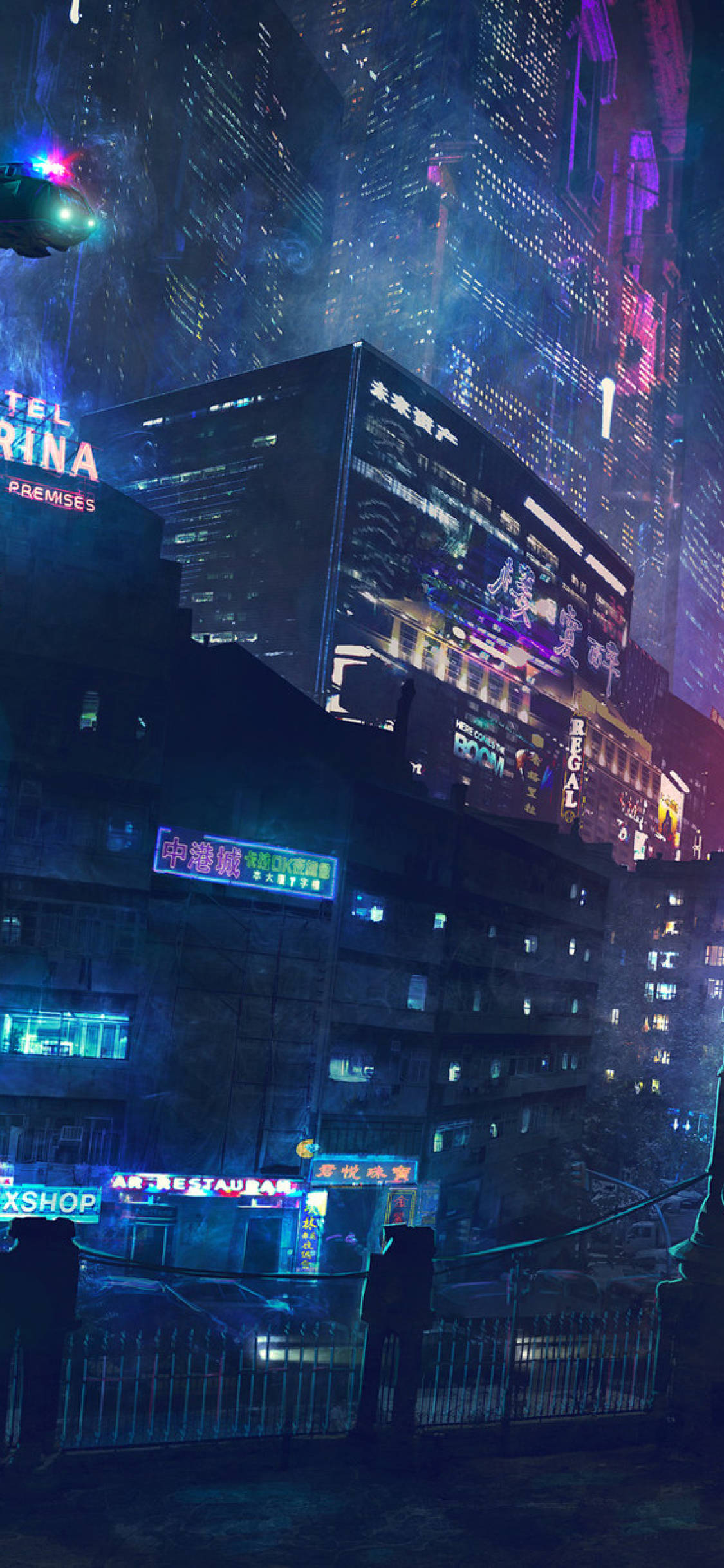 城市 桌布 壁紙 — 夜晚被霓虹燈浸透的賽博龐克城市景觀，高聳的摩天大樓閃爍著鮮豔的紫色、藍色和粉紅色燈光。