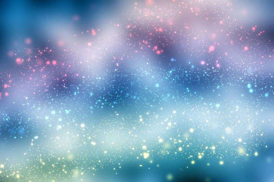 Sparkle 桌布 壁紙 — 夢幻漸變天空，充滿柔和藍色、粉紅色和黃色的閃光，飄過朦朧的雲層。
