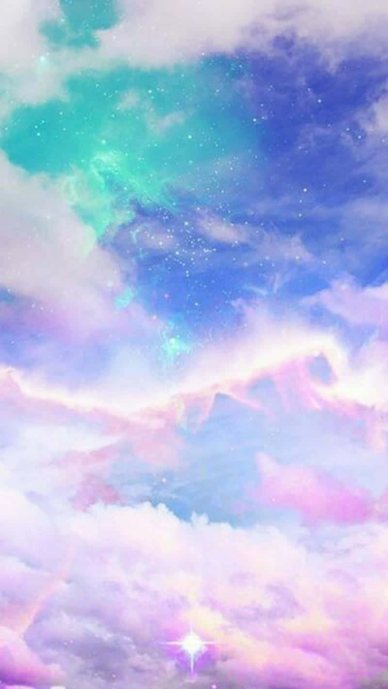 Cute Rainbow 桌布 壁紙 — 夢幻的天空，充滿了在青綠色、粉紅色和藍色中發光的柔和雲彩，閃爍的星星和下方燦爛的星爆。