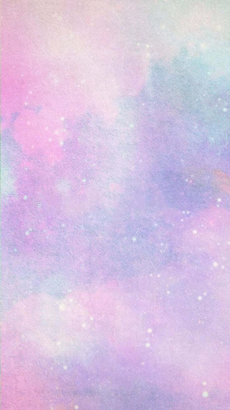 Kawaii Pastel 桌布 壁紙 — 夢幻的粉彩星系，有柔和的粉紅色、紫色和藍色雲朵，點綴著閃爍的星星。