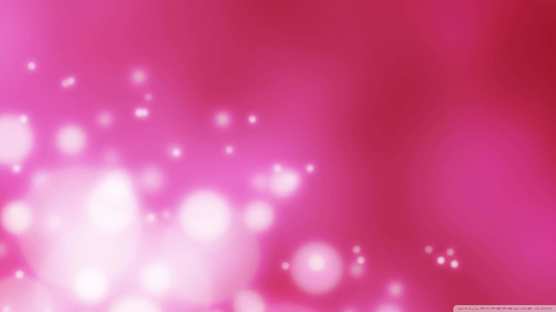 Simple Pink 桌布 壁紙 — 夢幻的粉紅色漸層，點綴著柔和發光的光斑，營造出神奇空靈的氛圍。