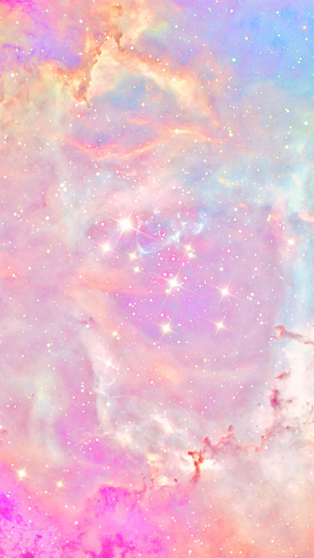 Girly Galaxy 桌布 壁紙 — 夢幻粉彩星系，粉紅、藍色和橙色星雲旋轉交織，點綴閃爍繁星。