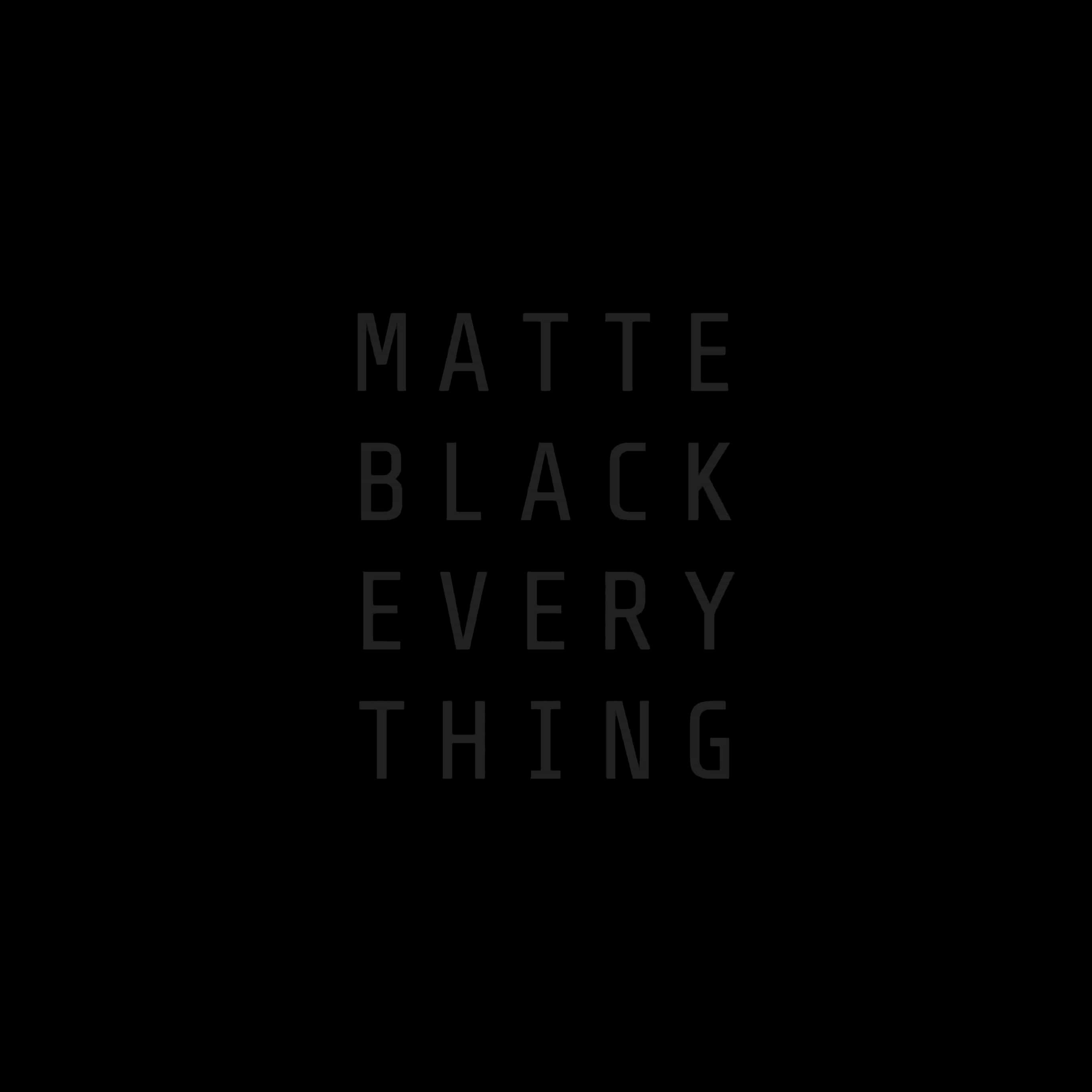 語錄 桌布 壁紙 — 大膽極簡文字在純黑背景上顯示 matte black every thing。