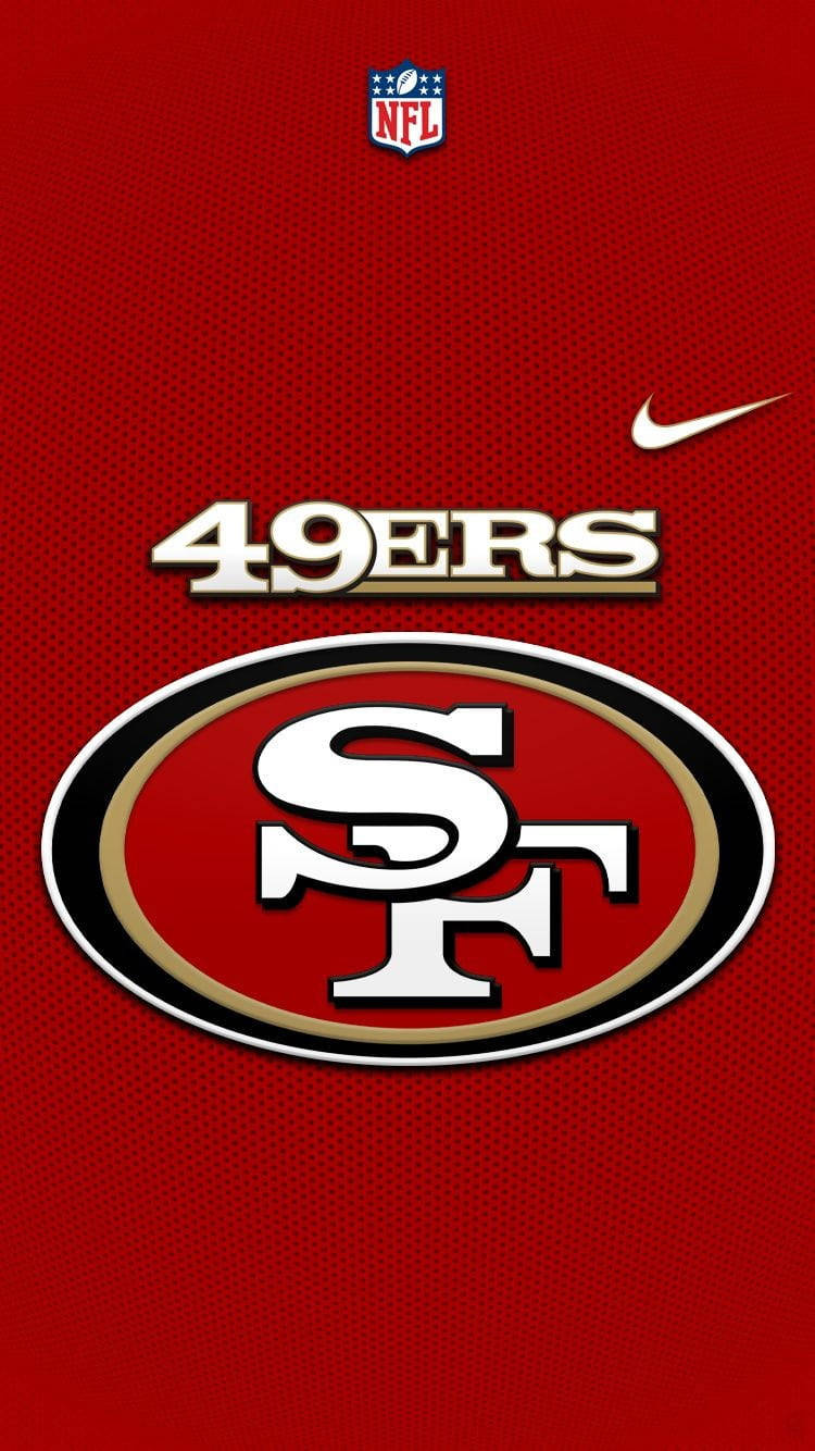 足球 桌布 壁紙 — 大膽的 San Francisco 49ers 標誌居中在帶紋理的紅色背景上，帶有 NFL 和 Nike 品牌標識。