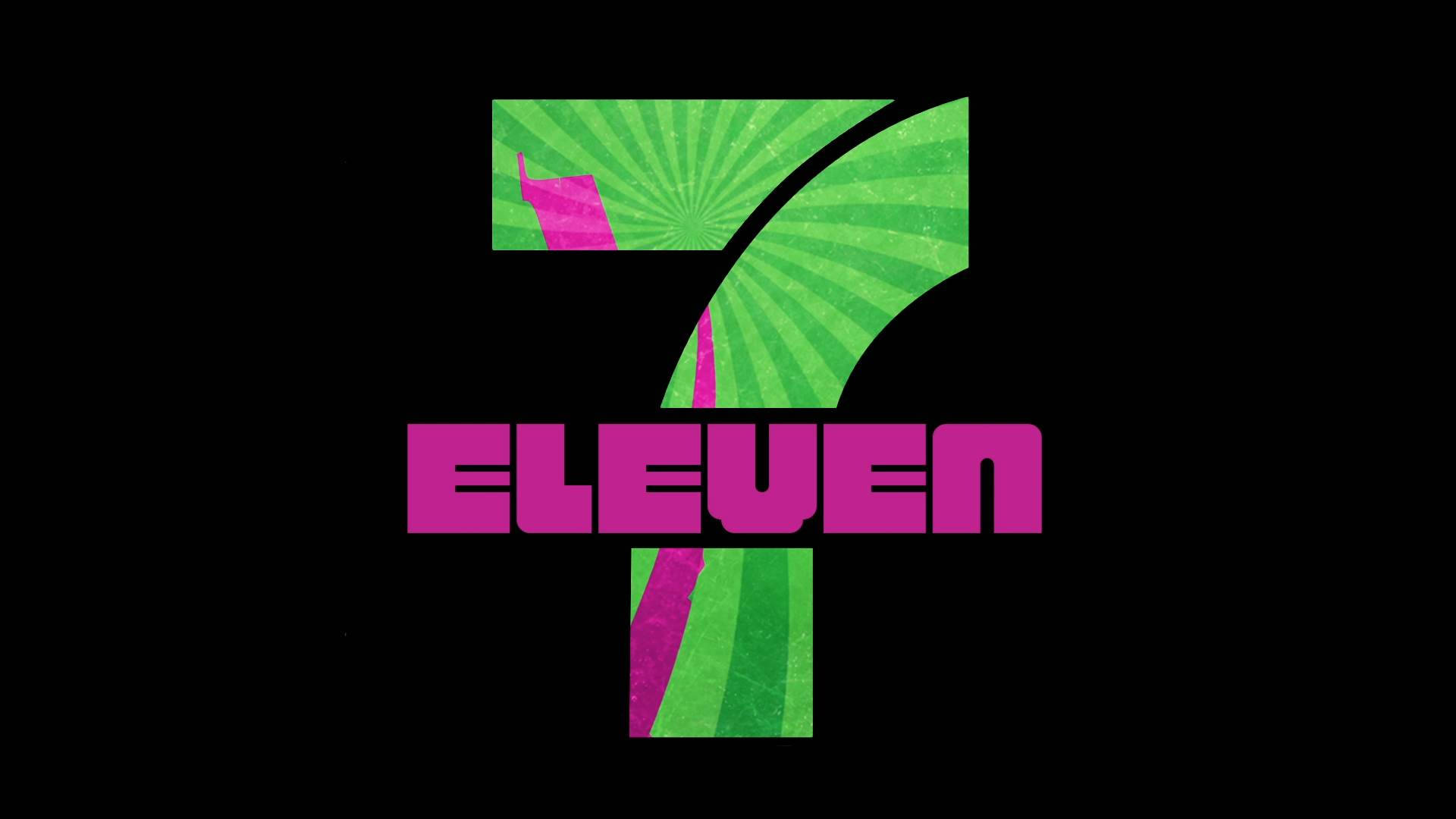 Eleven 桌布 壁紙 — 大膽的7 eleven標誌，帶有綠色太陽光芒和洋紅色文字，背景為黑色。