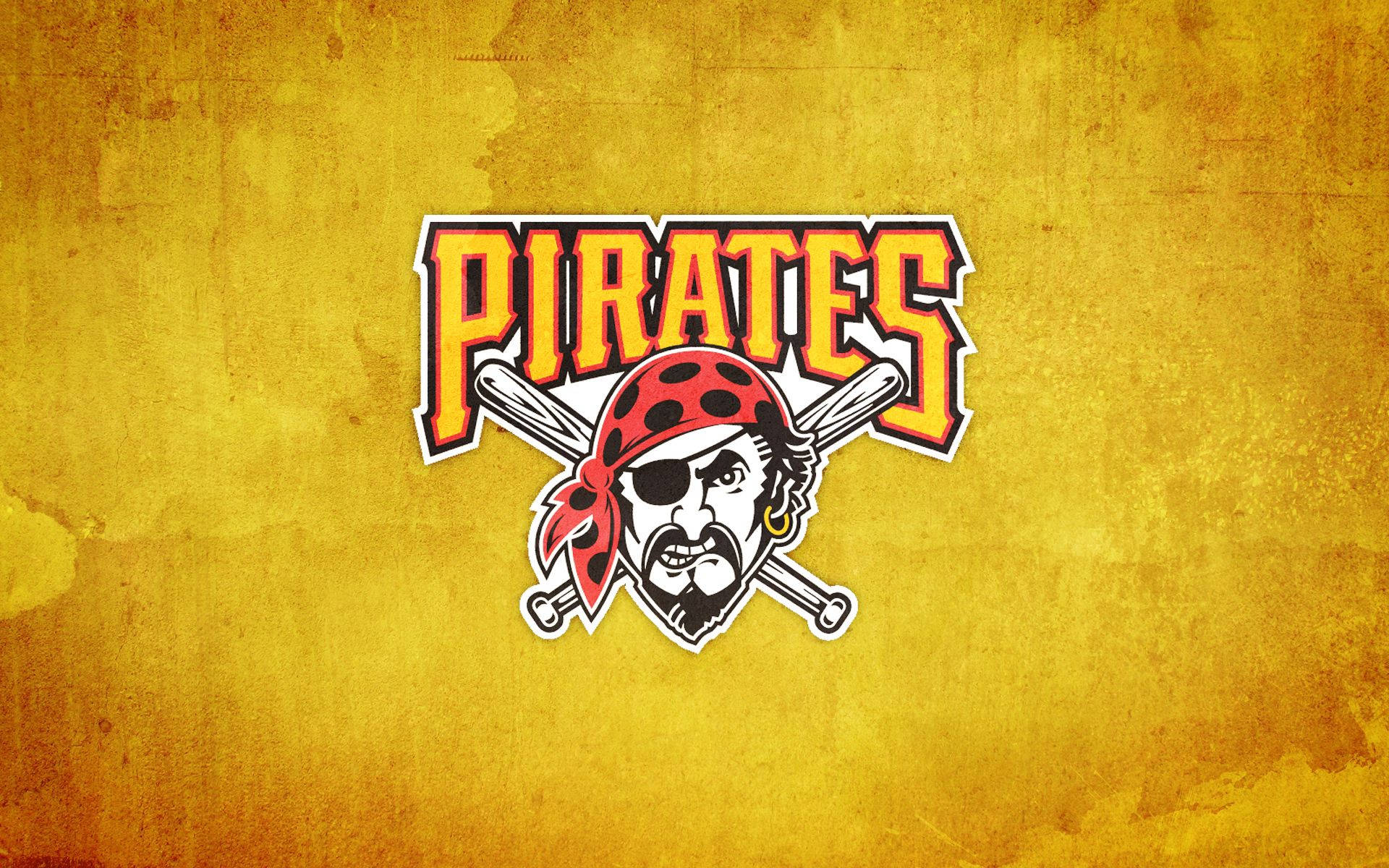 海盜 桌布 壁紙 — 大膽的Pirates標誌，帶有海盜臉和交叉的球棒，在紋理金色背景上。
