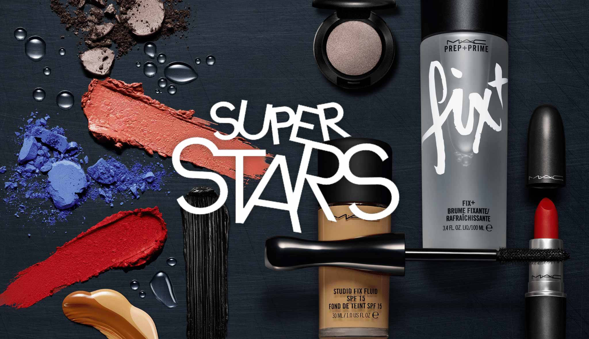 Cosmetics 桌布 壁紙 — 大膽的化妝品和鮮豔的顏料樣本在深色紋理表面上動態排列，帶有「SUPER STARS」文字。