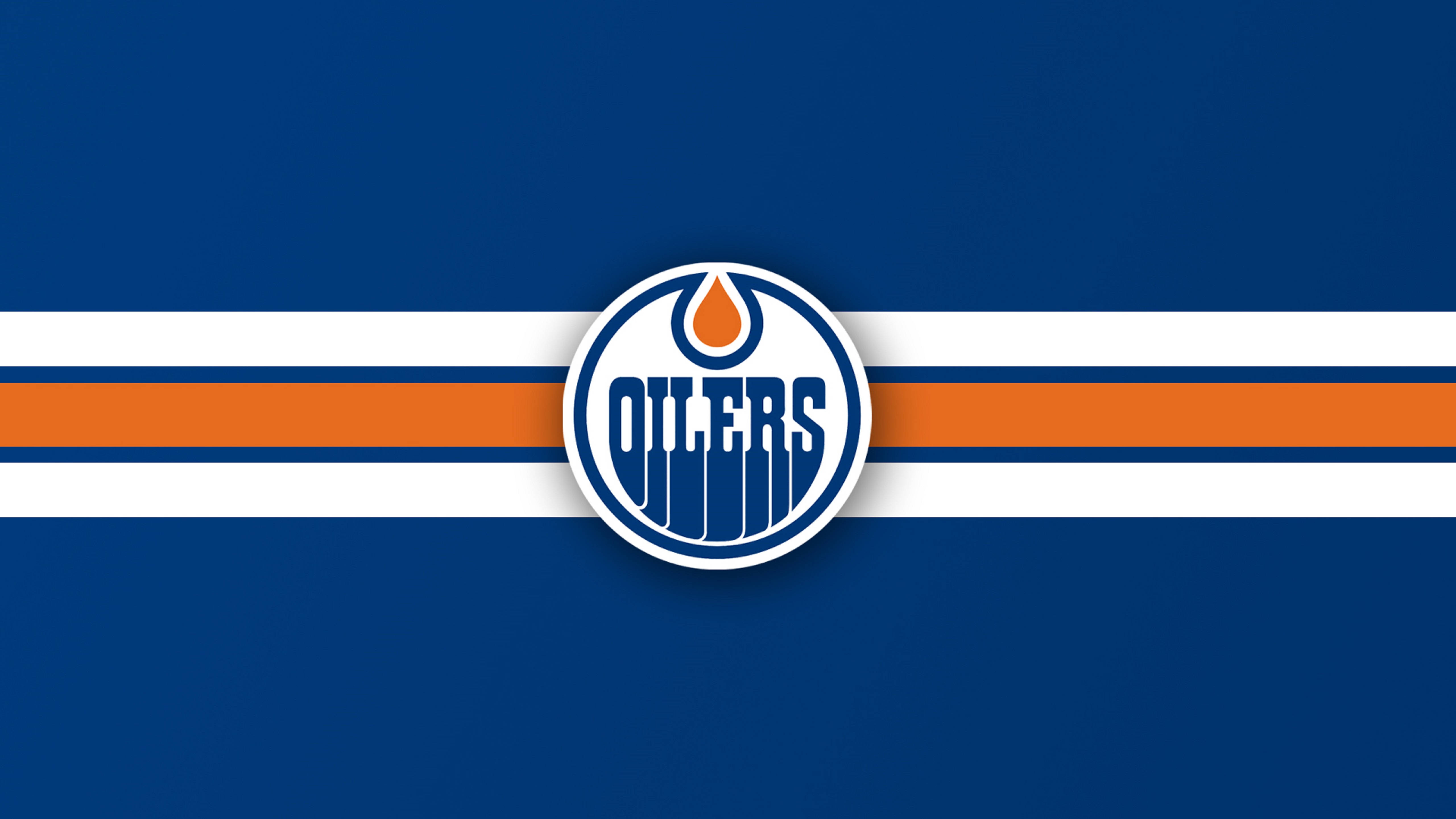 Oilers 桌布 壁紙 — 大膽的埃德蒙頓油人隊標誌居中於藍色背景上，帶有白色和橙色條紋。