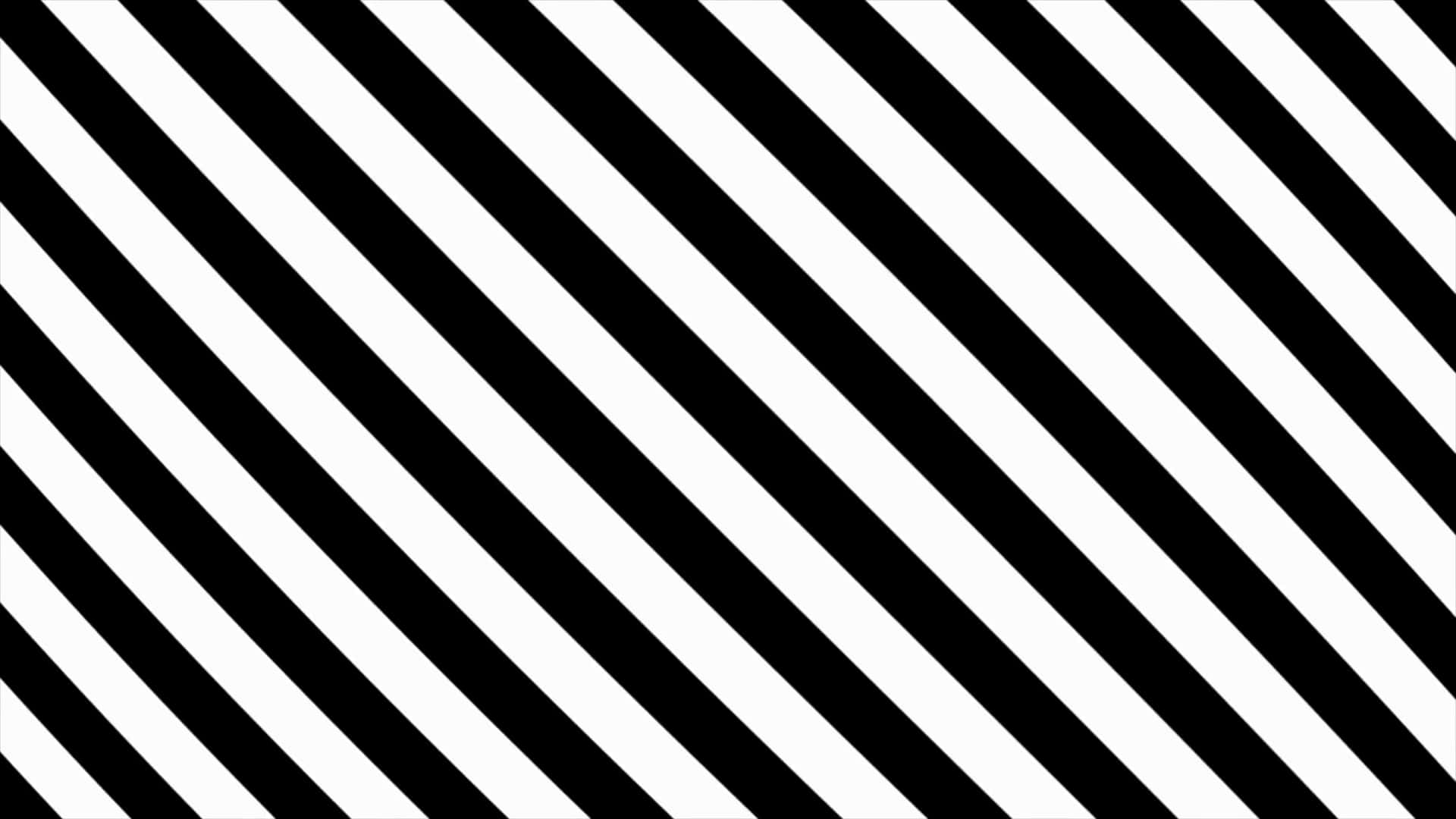 Black And White Striped 桌布 壁紙 — 大膽的對角黑白條紋在整個畫面中創造出高對比度的幾何圖案。