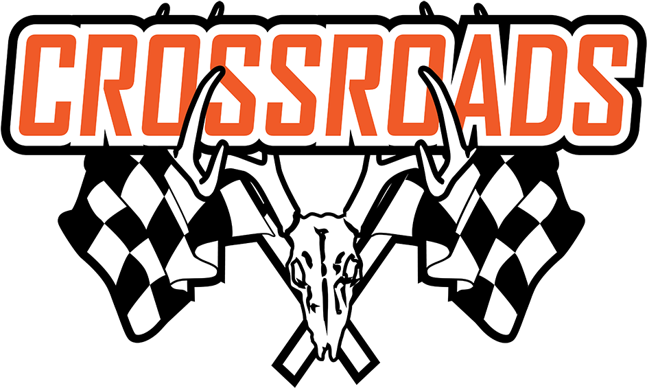 Crossroad 桌布 壁紙 — 大膽的橙色 CROSSROADS 文字拱起在白色鹿頭骨（帶鹿角）上方，兩側有黑白格子賽車旗，背景為黑色。