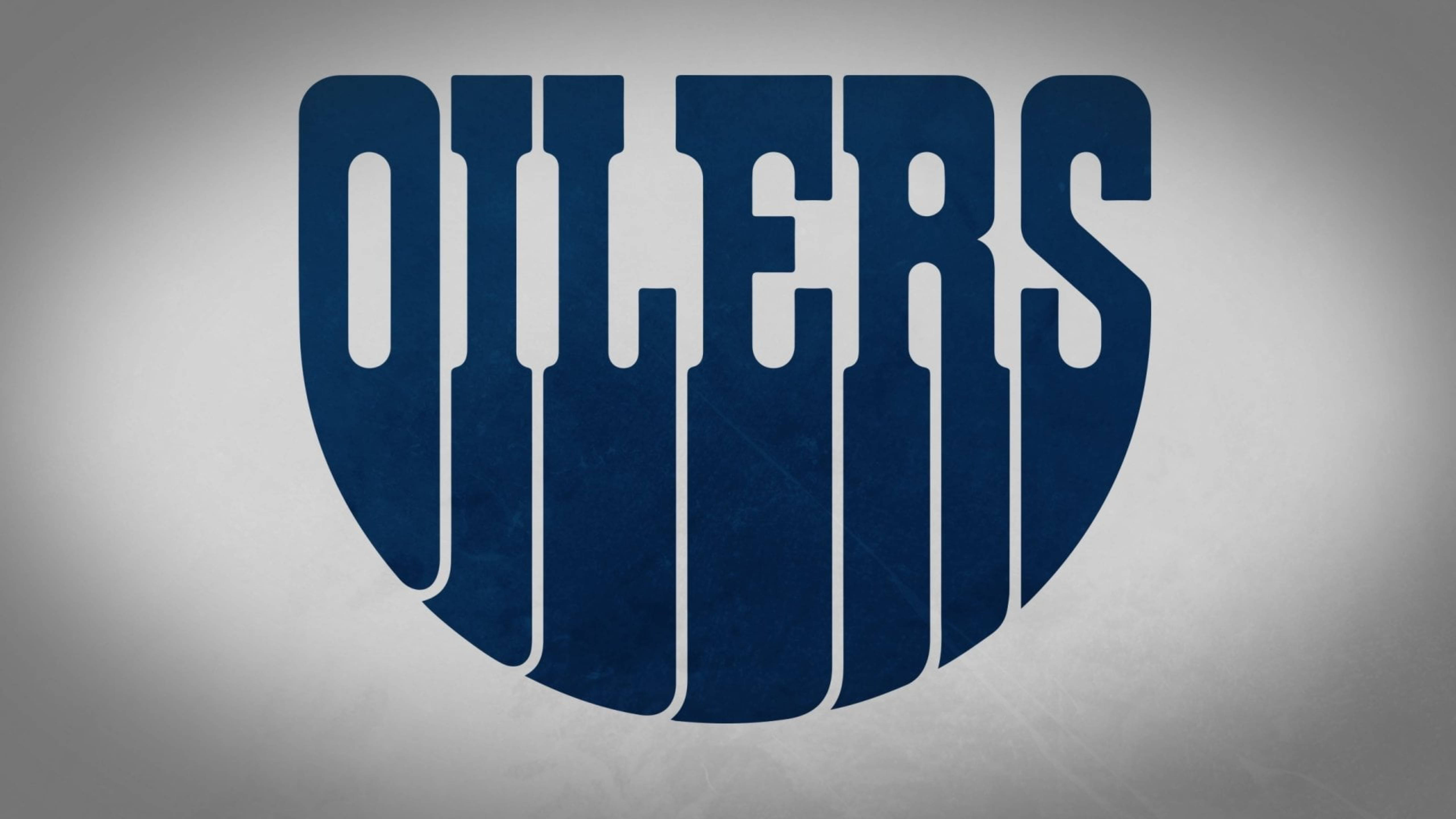 Oilers 桌布 壁紙 — 大膽的海軍藍色 'OILERS' 文字以盾牌形狀在帶有紋理的灰色背景上脫穎而出。