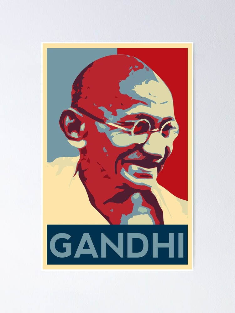 Mahatma Gandhi 桌布 壁紙 — 大膽的甘地普普藝術肖像，以紅色、藍色和奶油色呈現，在分割背景上微笑。