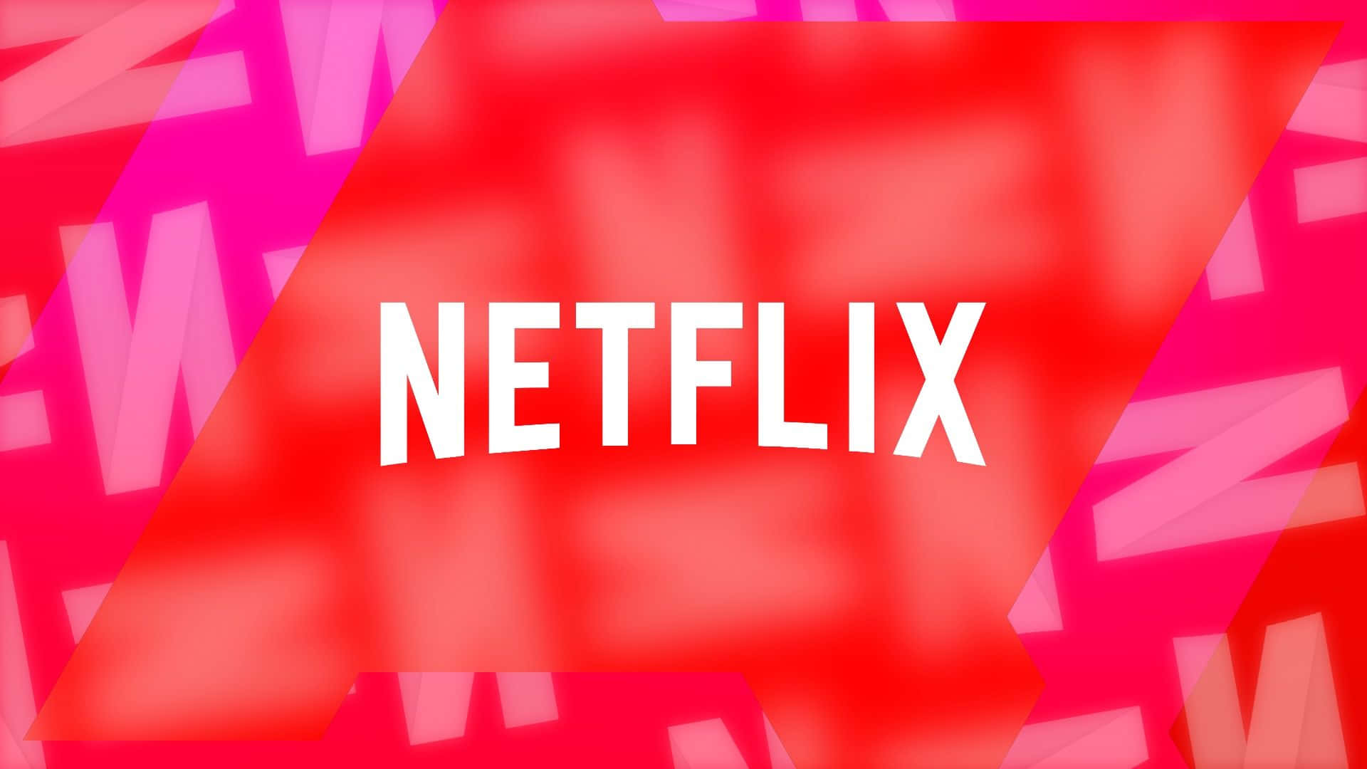 Netflix 桌布 壁紙 — 大膽的白色 Netflix 標誌居中於充滿活力的紅色和粉紅色幾何背景上，帶有模糊的 N 形狀。