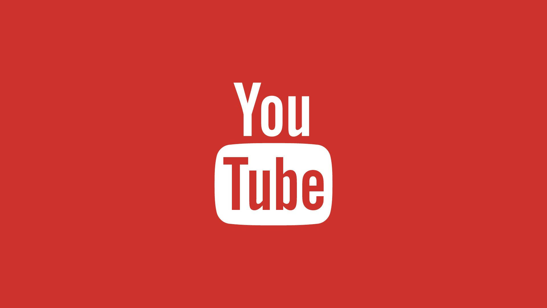 美學 桌布 壁紙 — 大膽的白色 YouTube 標誌居中在純紅色背景上，設計簡潔極簡。