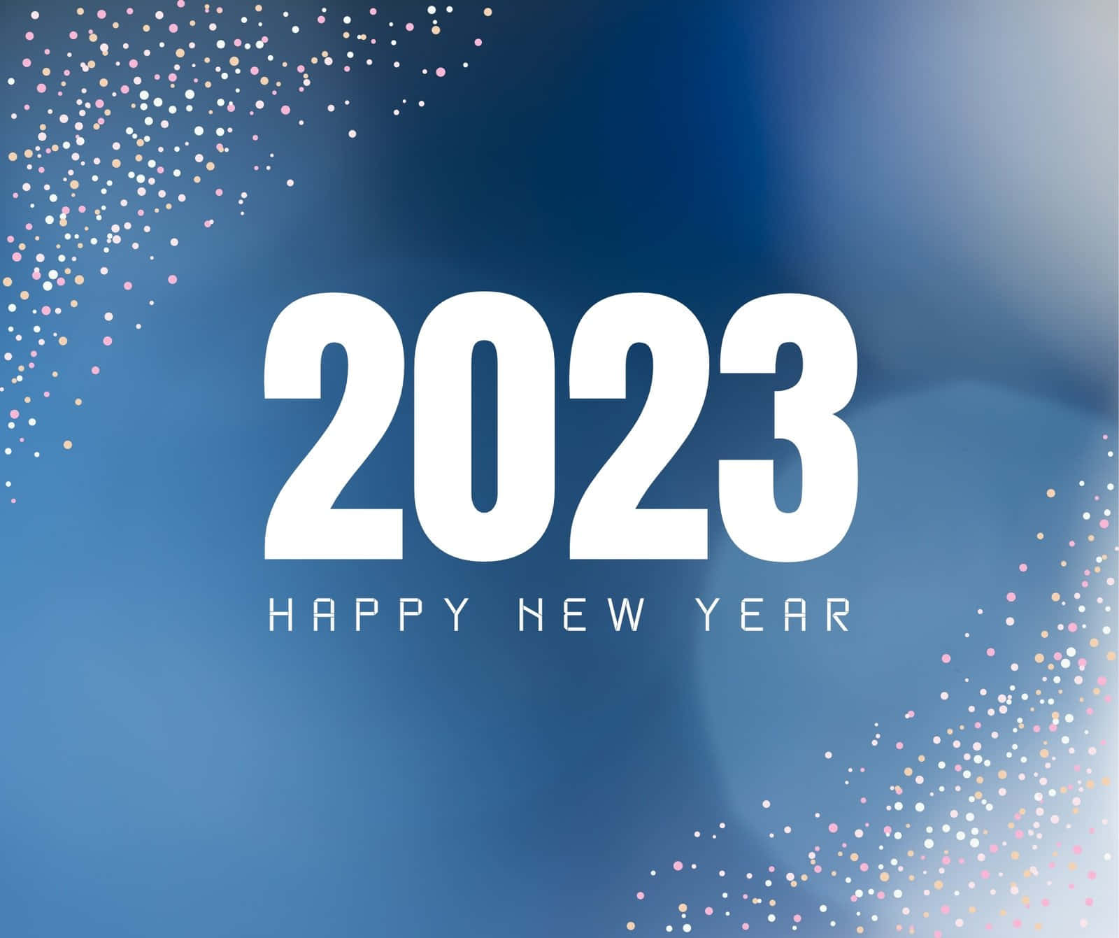 新年 桌布 壁紙 — 大膽的白色2023文字在漸變藍色背景上慶祝新年，並帶有閃閃發光的五彩紙屑點綴。