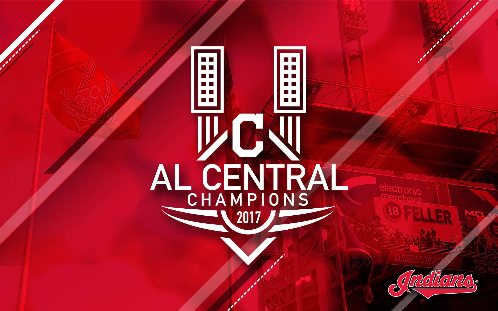 Cleveland Indians 桌布 壁紙 — 大膽的白色AL Central Champions 2017標誌主導了帶有紅色色調的棒球場背景，可見標牌和旗幟。