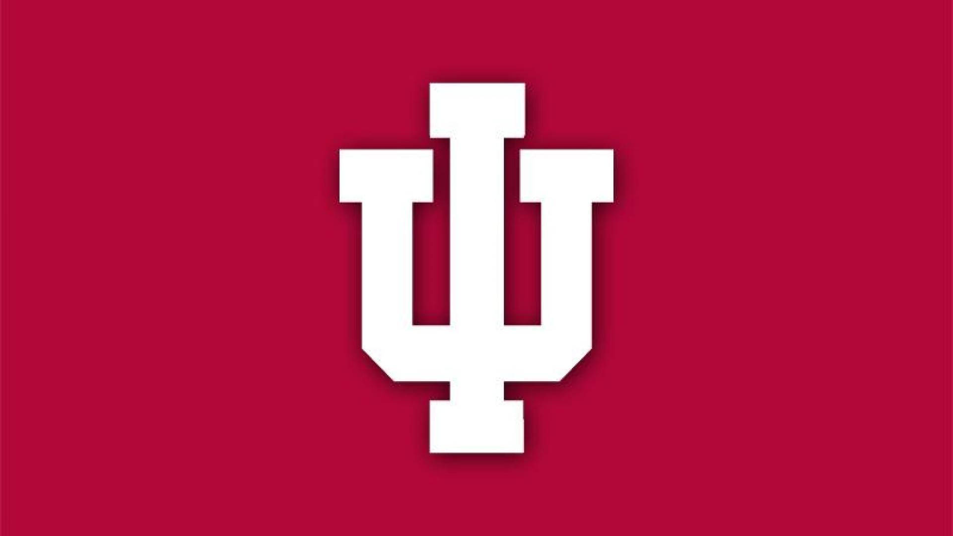 Indiana 桌布 壁紙 — 大膽的白色IU標誌置中於純深紅色背景上，帶有微妙的陰影。
