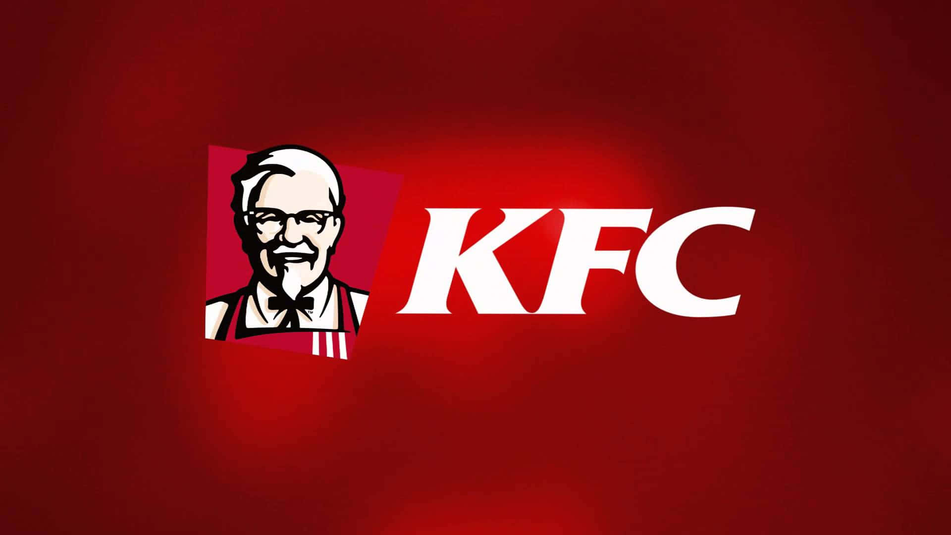 肯德基 桌布 壁紙 — 大膽的白色KFC標誌和桑德斯上校肖像在豐富的紅色漸變背景上發光。