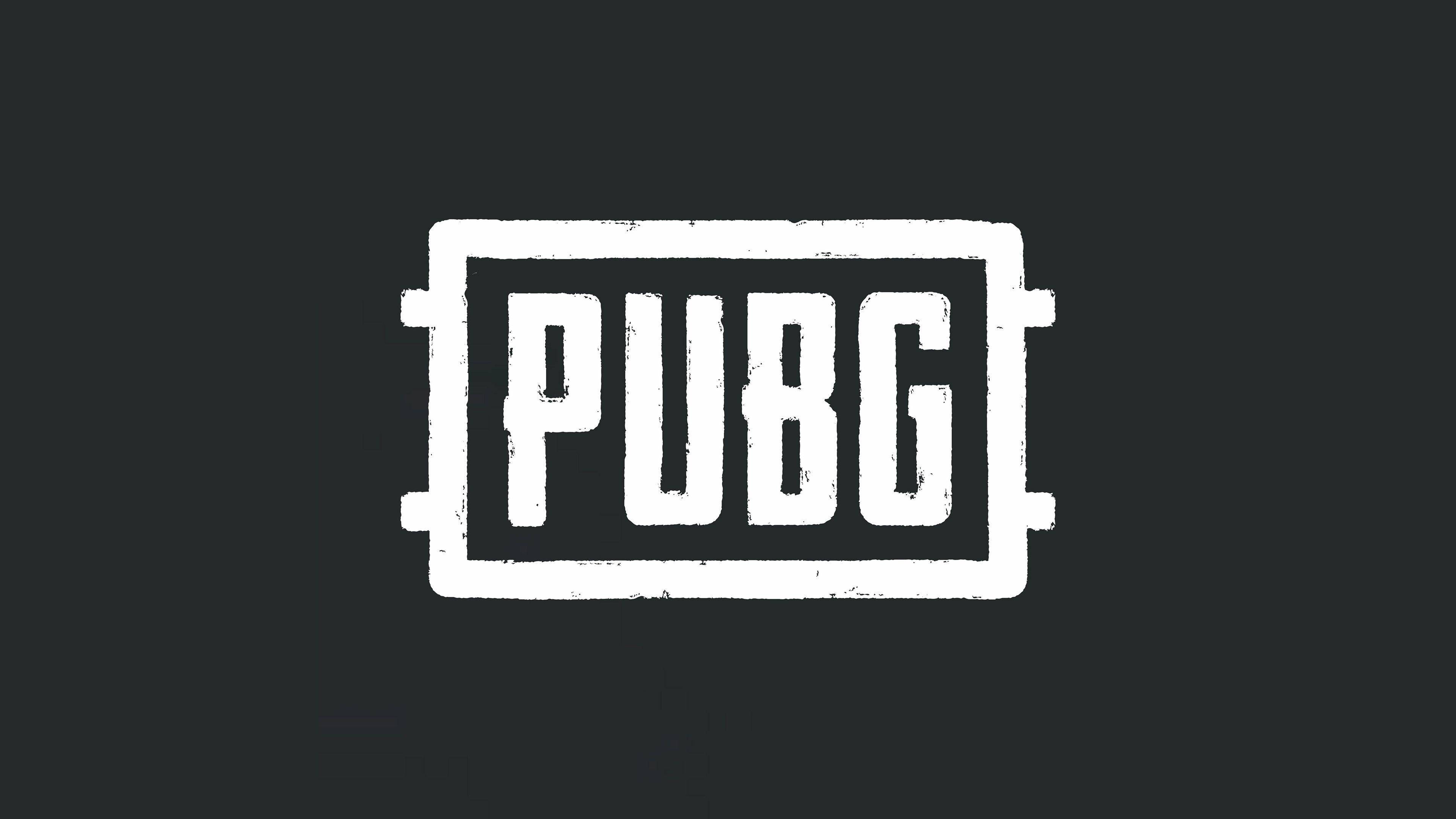 Pubg Logo 桌布 壁紙 — 大膽的白色PUBG標誌，帶有磨損紋理，居中於純深灰色背景上。